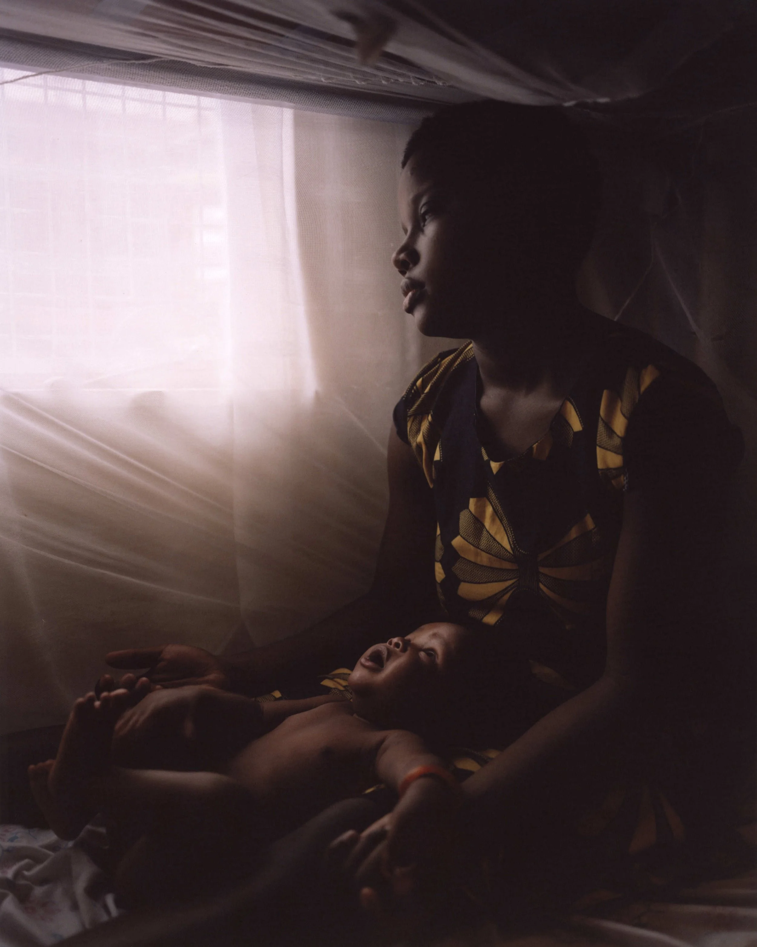  Veronika, 15, and Sami, 5 months.  “Sometimes I can’t sleep. I look at Samuel and think about what happened that Sunday I was raped by the pastor. I did not know him - I didn’t even come to his church.  When I got pregnant, I wanted to take my own l