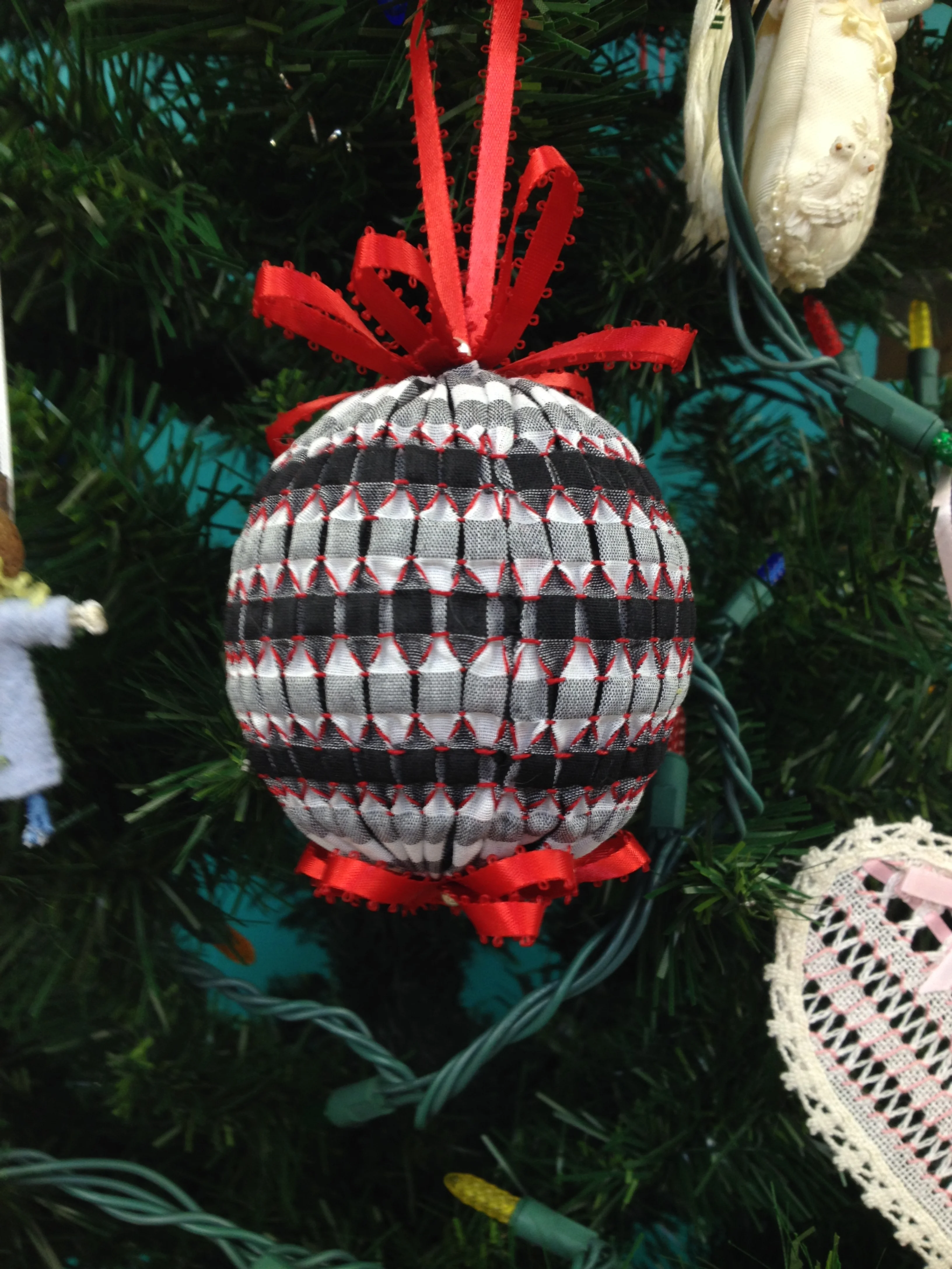 smocked ball on gingham fabric