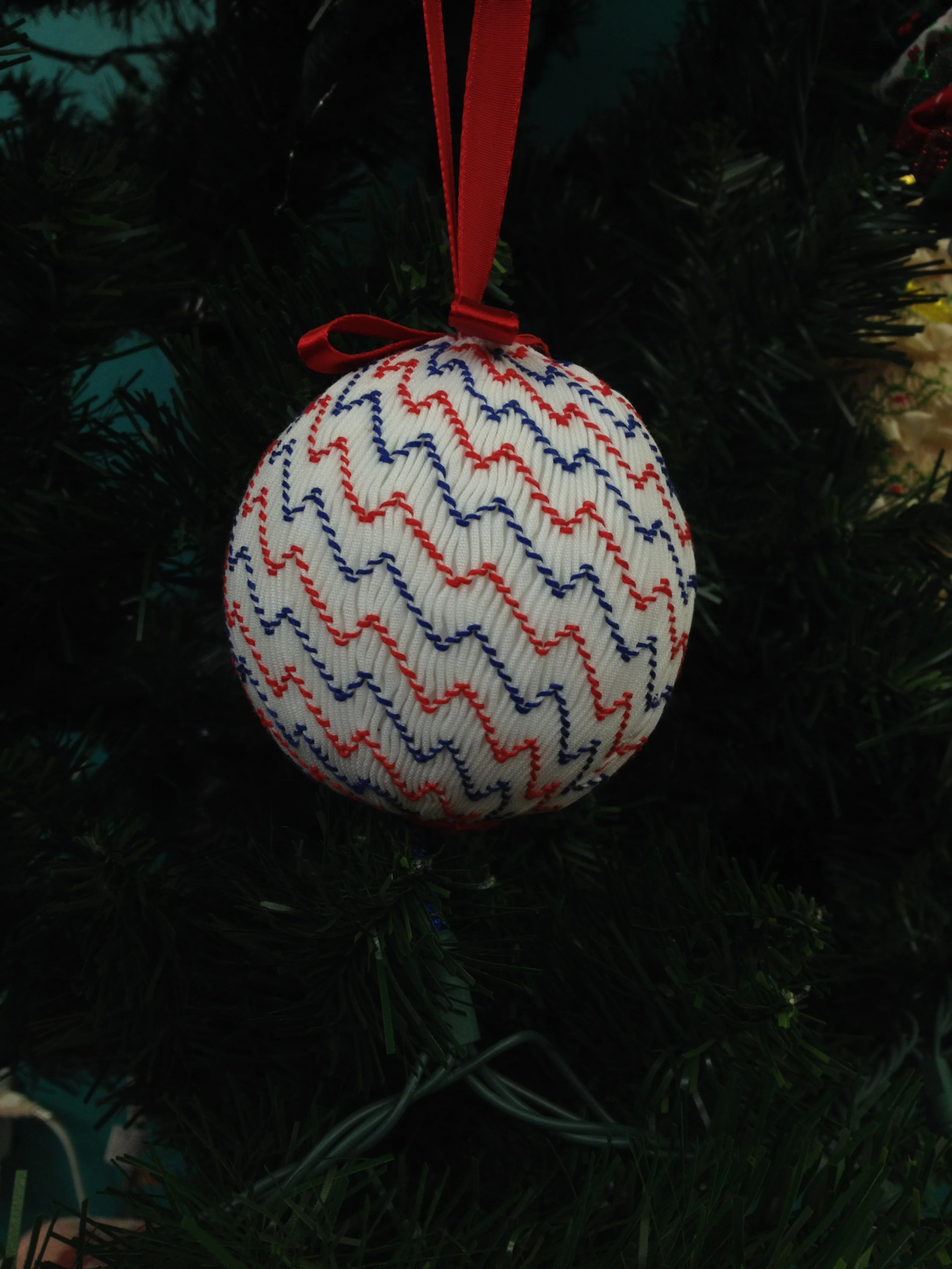 blue and red smocked zigzags