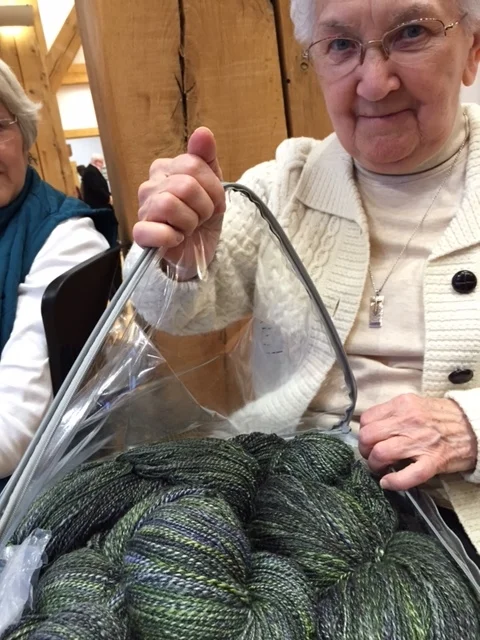 Sister Edith and some yarn that another nun spun. We discussed what she should make with it.