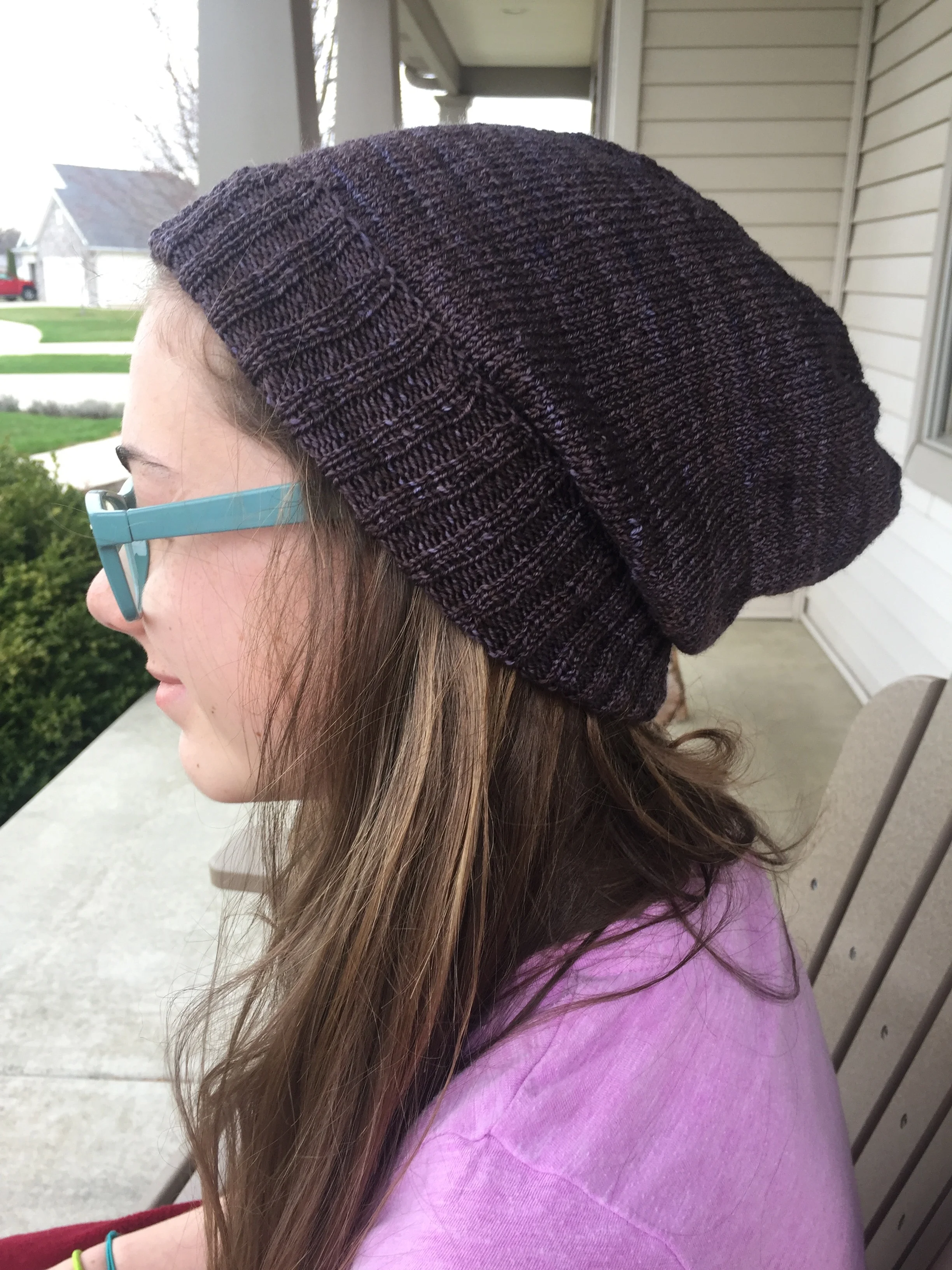Daughter modeling "Sock Head" pattern with Malabrigo sock yarn