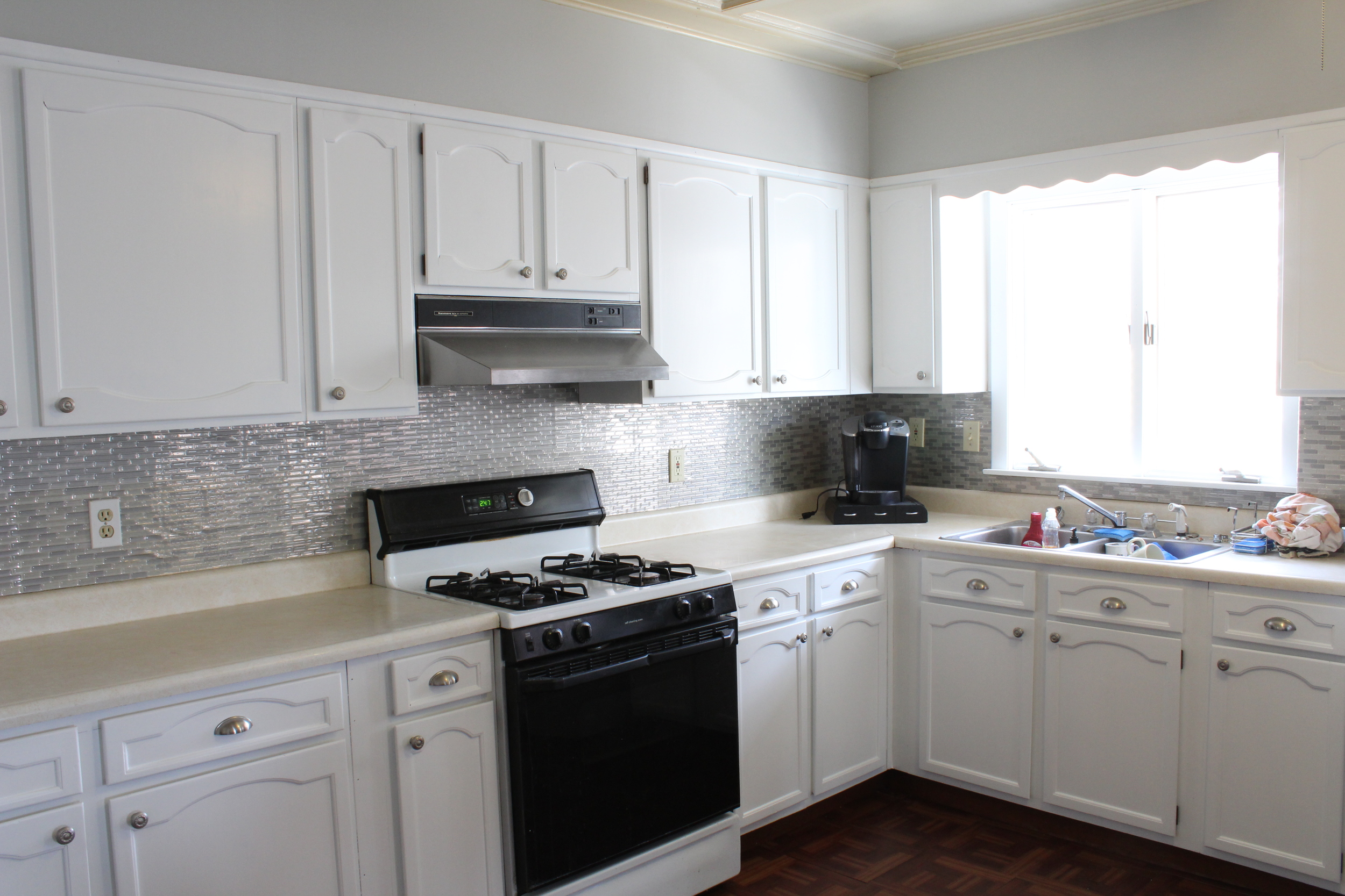 A recent cabinet refinish job I completed.