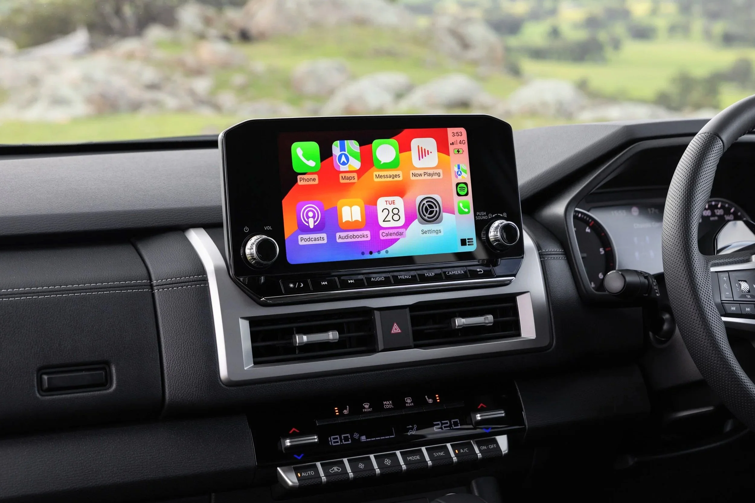 Both wireless CarPlay and Android Auto; not something you'll find on a Hilux.