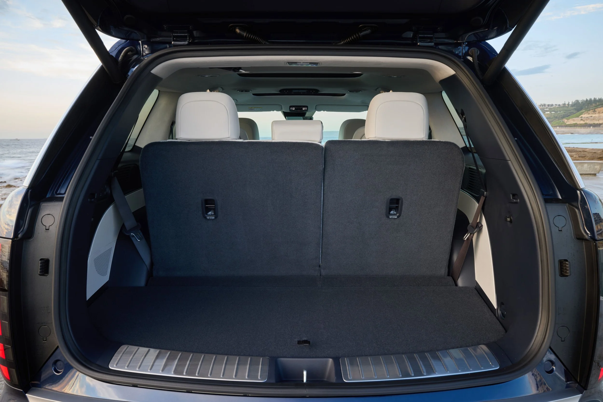 Behind row 3 is about half a metre of usable cargo floor