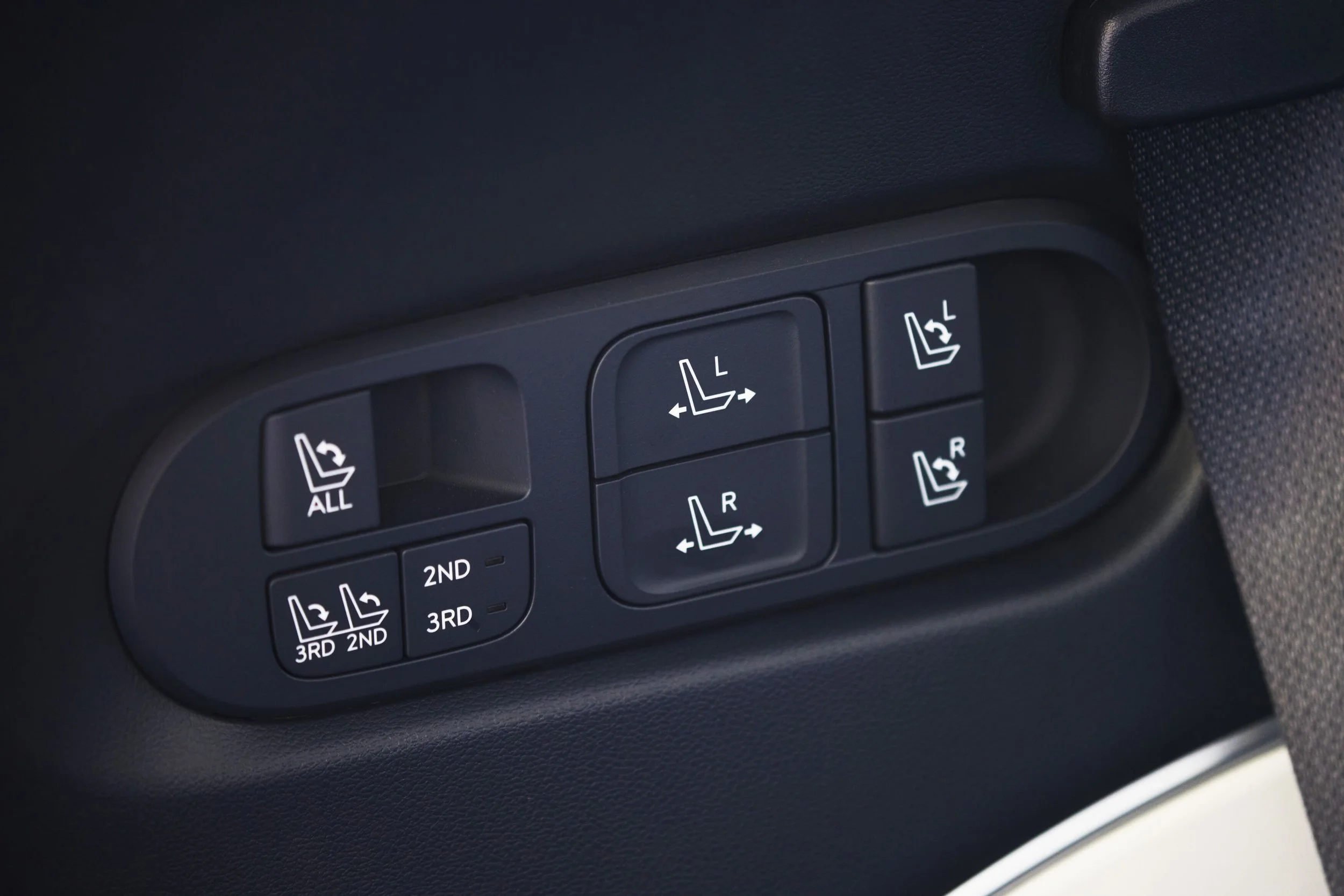 You can electrically command exactly which seats you want to drop, once you decode the heiroglyphs