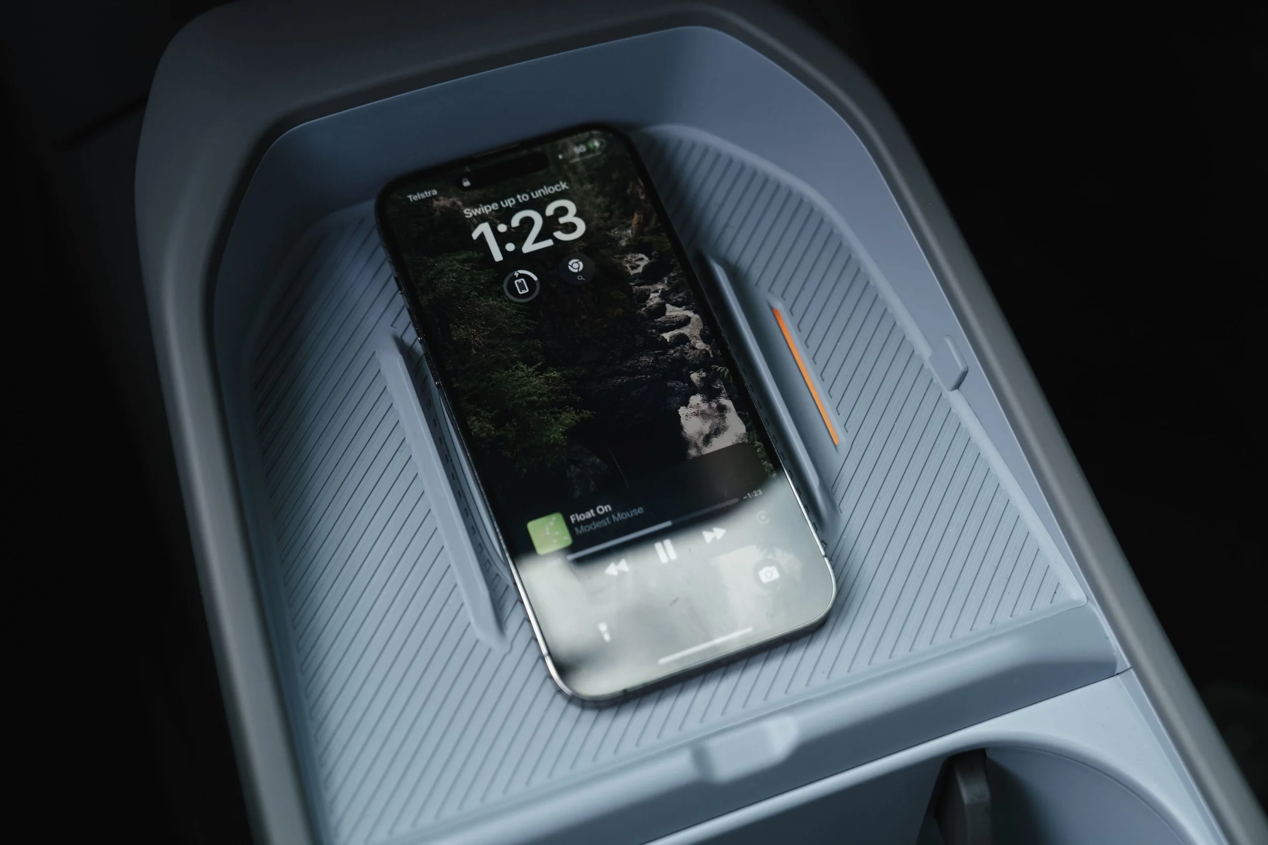 It might be designed to hold a single phone in the centre, but two can fit in the tray