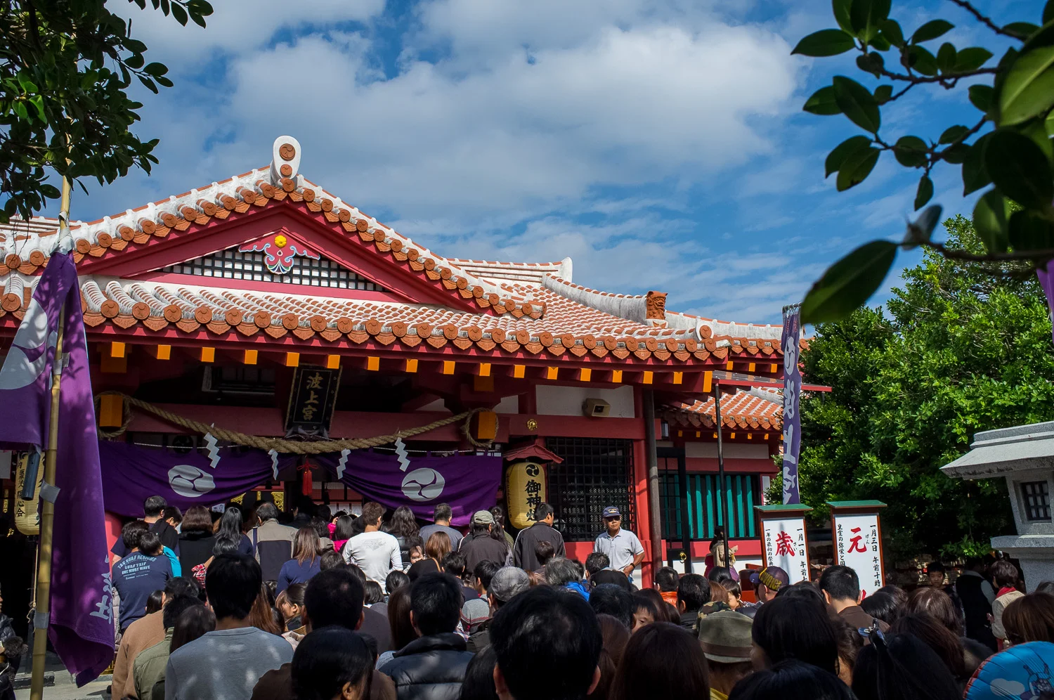 People waiting in line to pray at Nominoue Shrine in Okinawa, Japan on New Year's day.