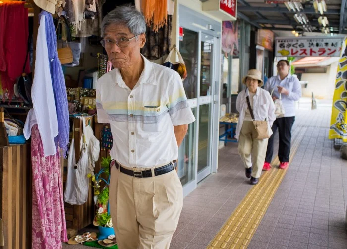 Man shopping at Kyoda rest stop in Okinawa.