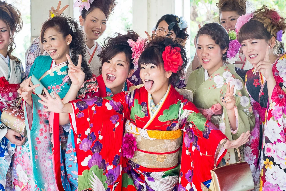 A group of young women pose for a photo at The Coming of Age Day ceremony in Yomitan, Okinawa Japan.