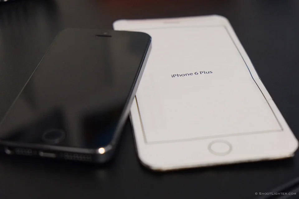 My iPhone 5s next to an iPhone 6 Plus mockup, the closest thing I can get right now to the real thing. :)
