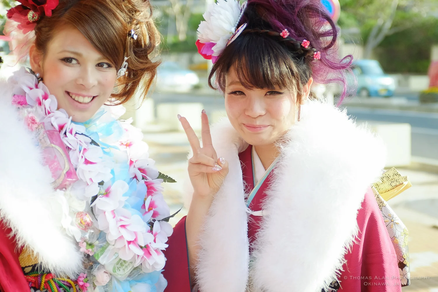 Young girls wearing furisode (kimono) in Naha for Seijin no Hi, Coming of Age Day. 2015. Fuji x100s w/ TCL-X100.