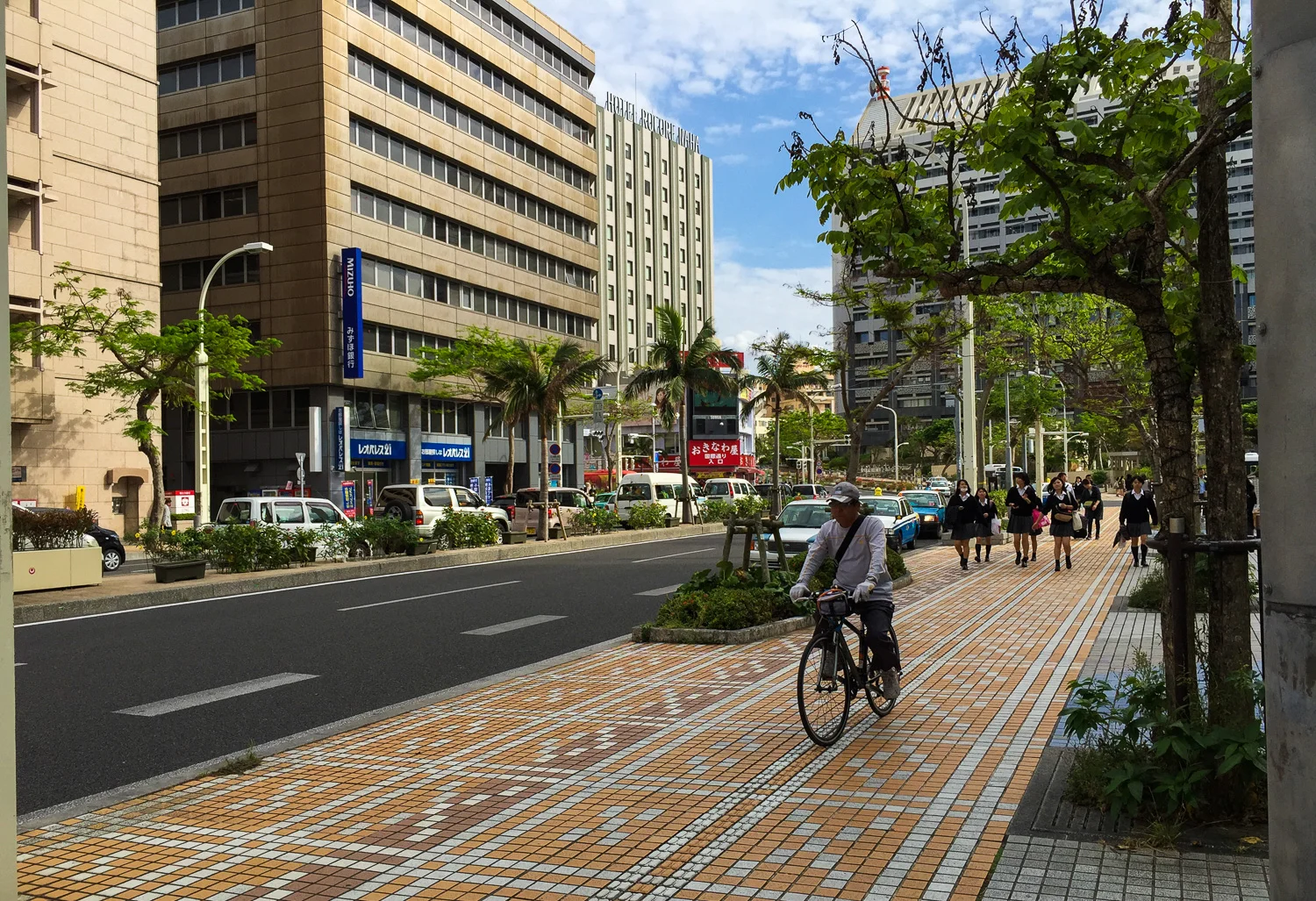 Street scene in Naha, Okinawa, Japan. Apple iPhone 6 Plus at ISO 32, f2.2, 1/2000 sec.