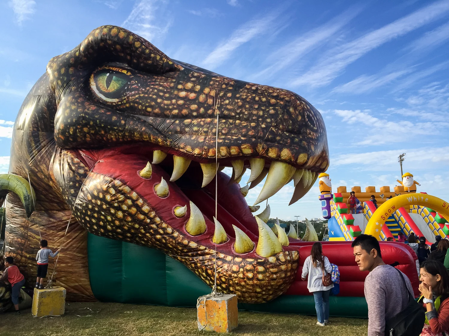 Families enjoying a local festival in Okinawa. Apple iPhone 6 Plus ISO 32, f2.2, 1/1000 sec.