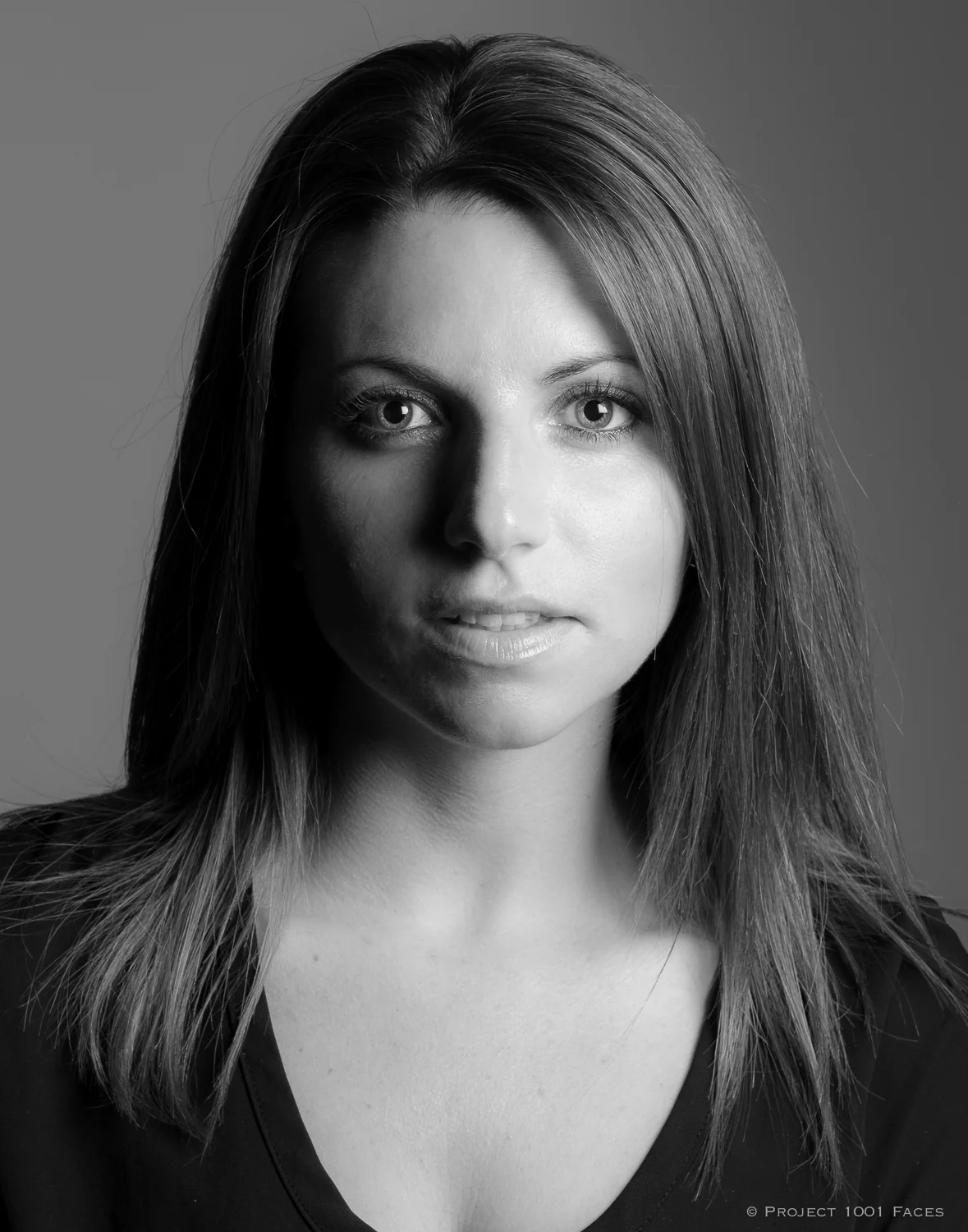 Fuji X-Pro1, 56mm ISO400, f/9, 1/125 sec. One speedlight setup at 1/2 Power in a Joe McNally white lined Softbox, and a small silver reflector for fill. Processed using the Fuji monochrome + yellow filter in Lightroom.
