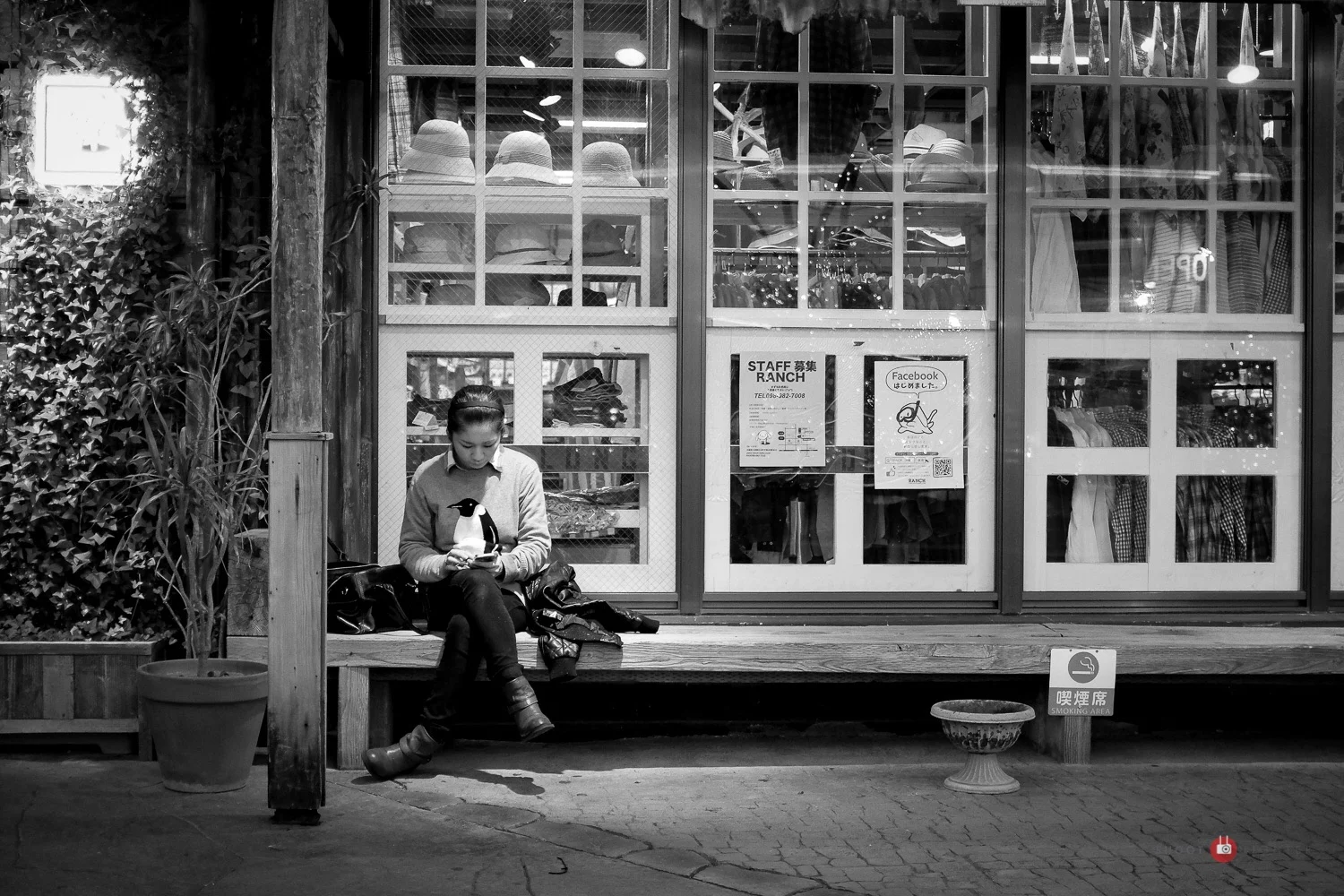 American Village in Chatan, Okinawa. Fuji x100s w/ TCLx100 Teleconverter - ISO2500, f/2, 1/125 sec. Edited in Lightroom. 
