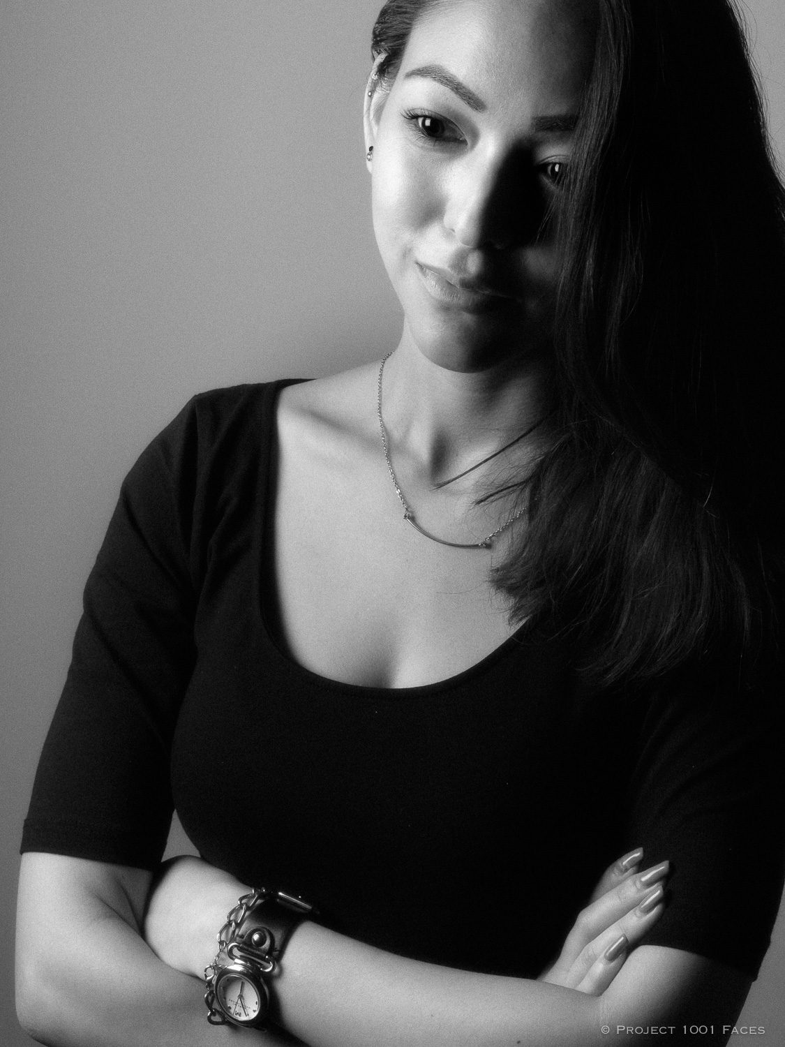 Fuji x100s w/ TCLx100, ISO32 0, f/11 , 1/125 sec. One speedlight setup at 1/2 Power in a Joe McNally white lined Softbox. . Processed using the Fuji monochrome + yellow filter. Grain added last in Lightroom 5.5.