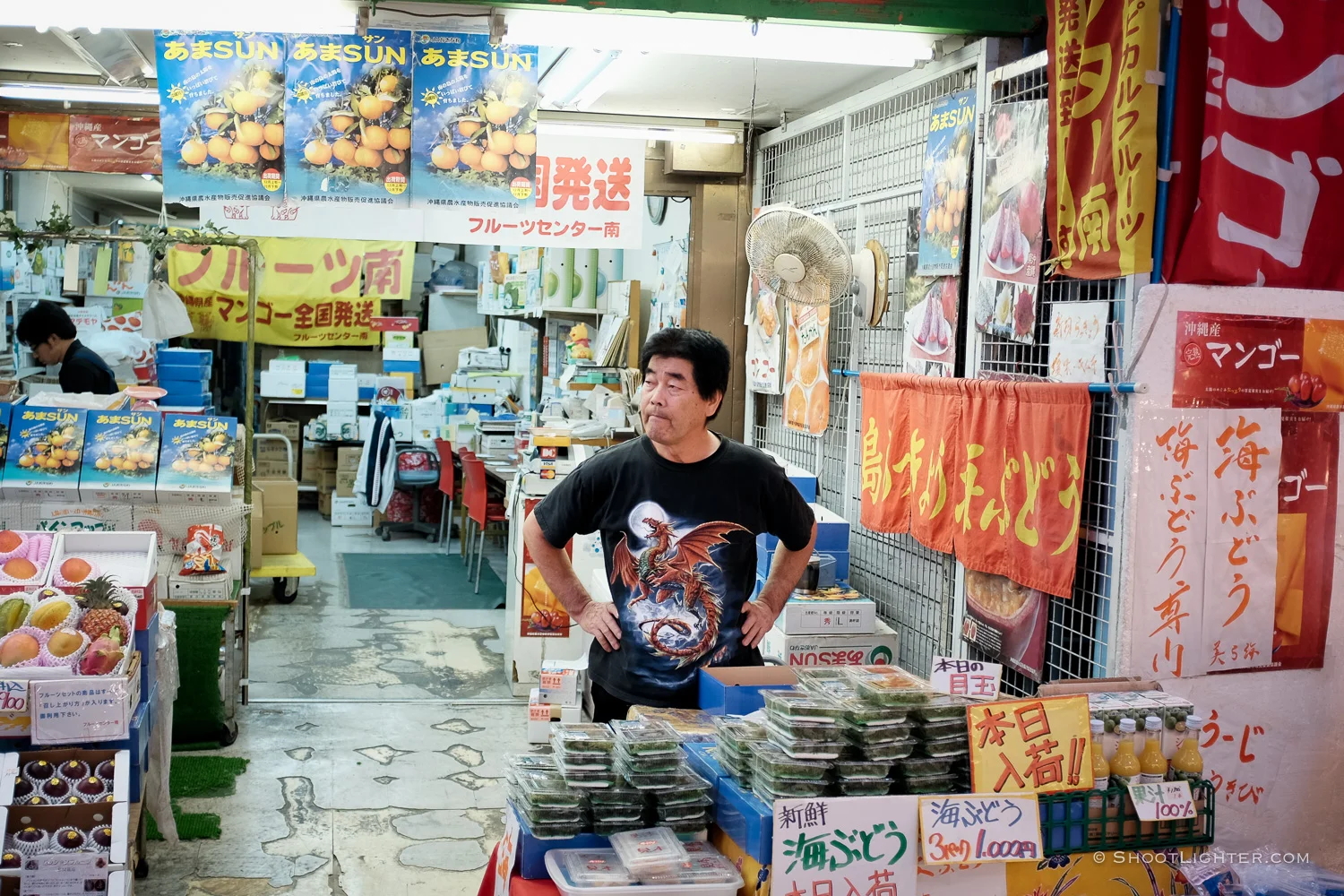 Okinawa Shop Keeper in Naha, Okinawa Japan. Fujifilm x100T, ISO 400, f/2.0, 1/105 sec, Fujifilm chrome film emulation, edited in Adobe Lightroom 6.
