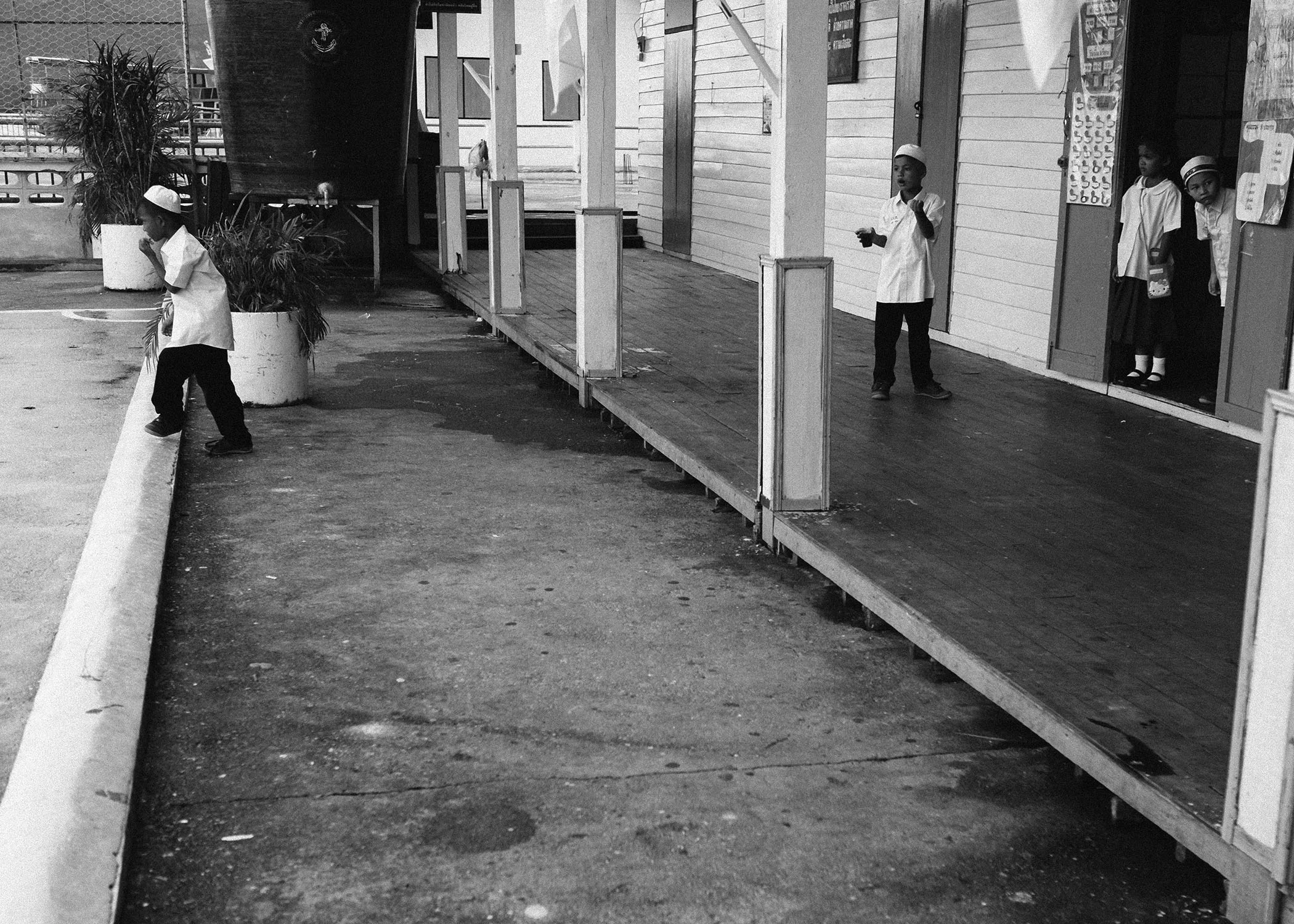Local school kids playing around before prayer time