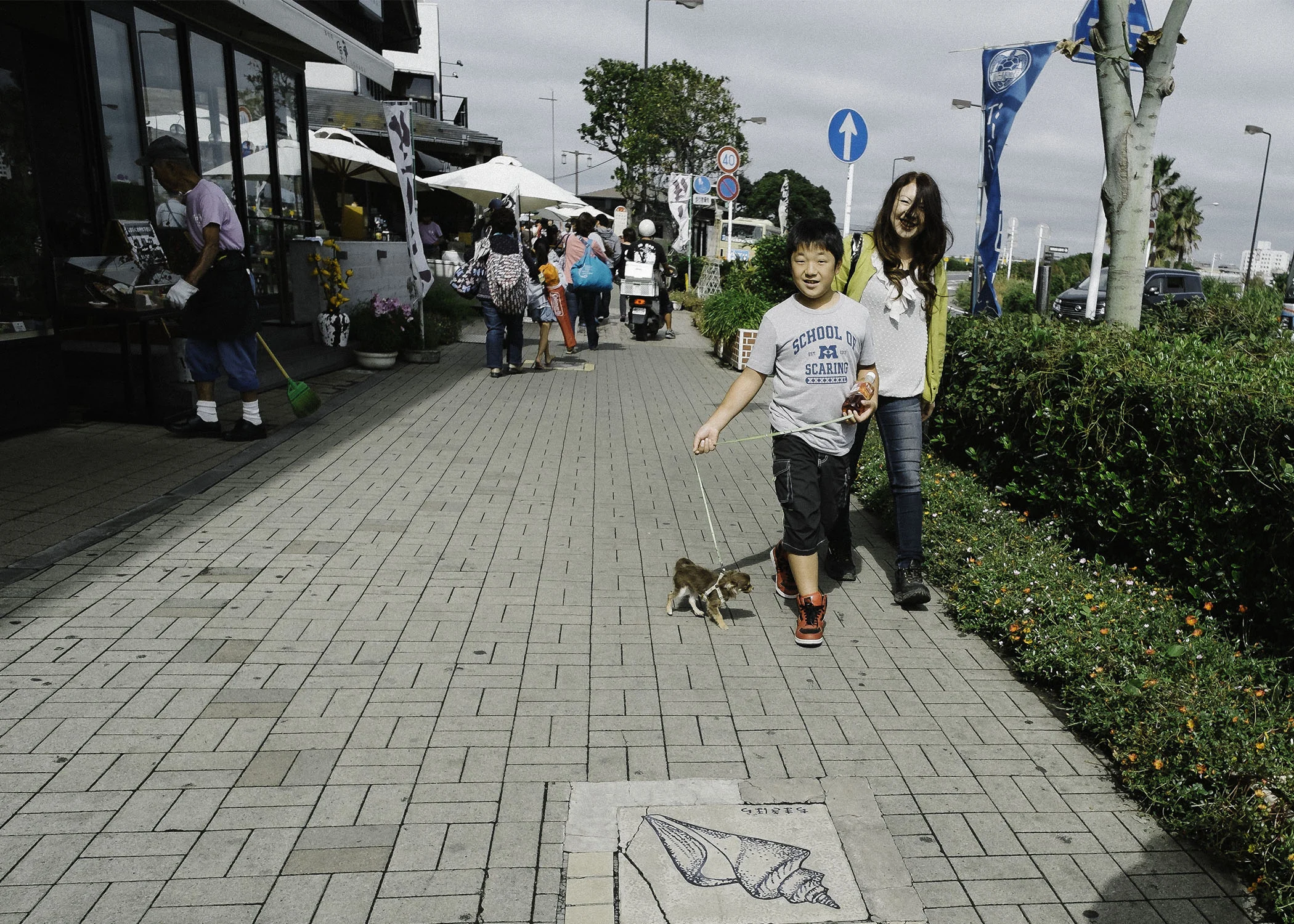 Friendly locals walking their dogs around near the harbor. Mind you lots of dogs here.