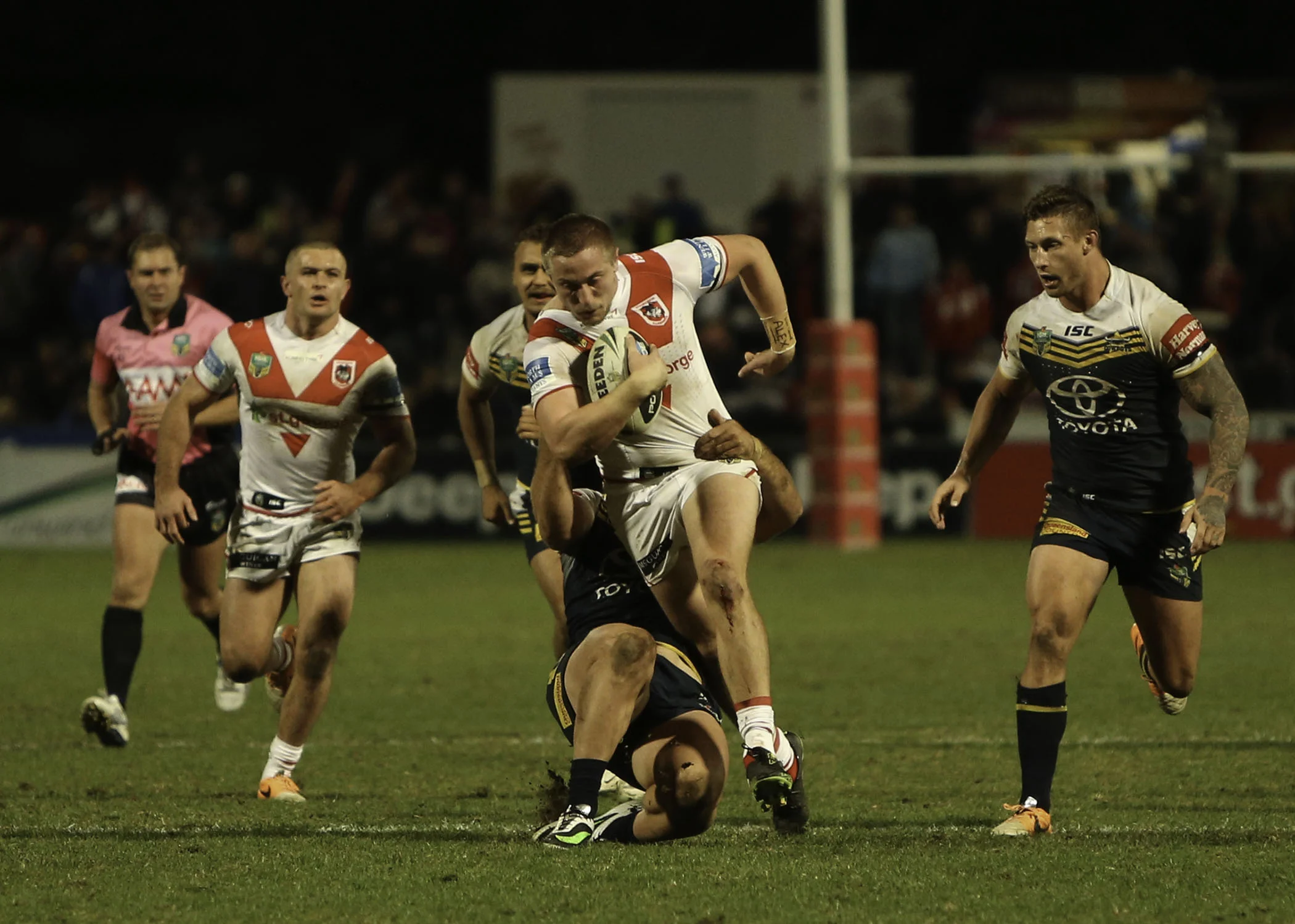 Stockwell makes a late break in the game but it is in vain. The run led to no increase in the score for the Dragons and the Cowboy's scored a late consolation try in the 80th minute to make the full time score 27-24.