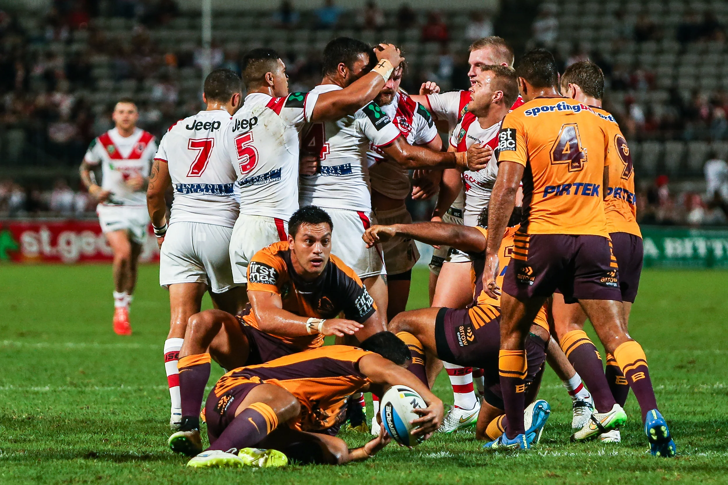 The Dragons back slap after creating a knock on.