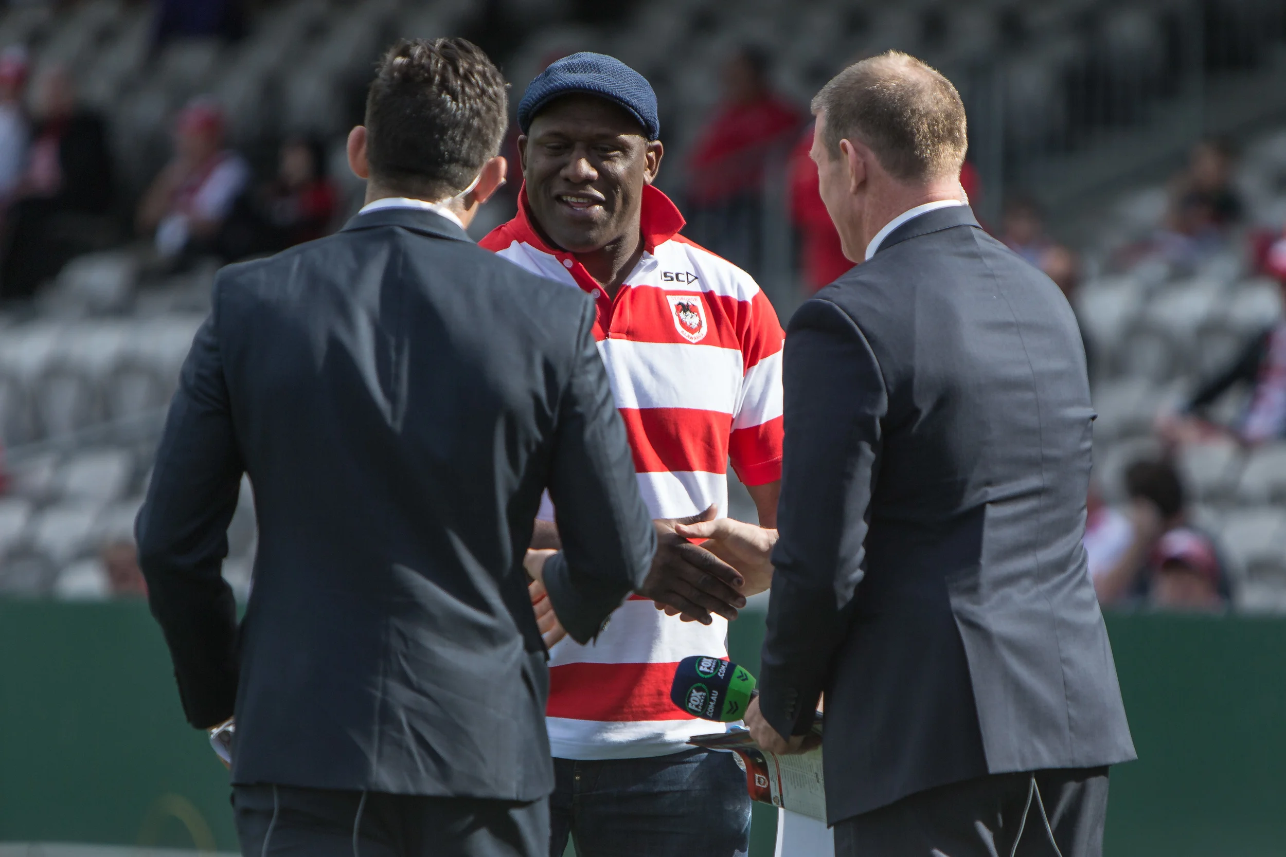 Big Dell greets Fox presenters Braith Anasta and Jimmy Smith