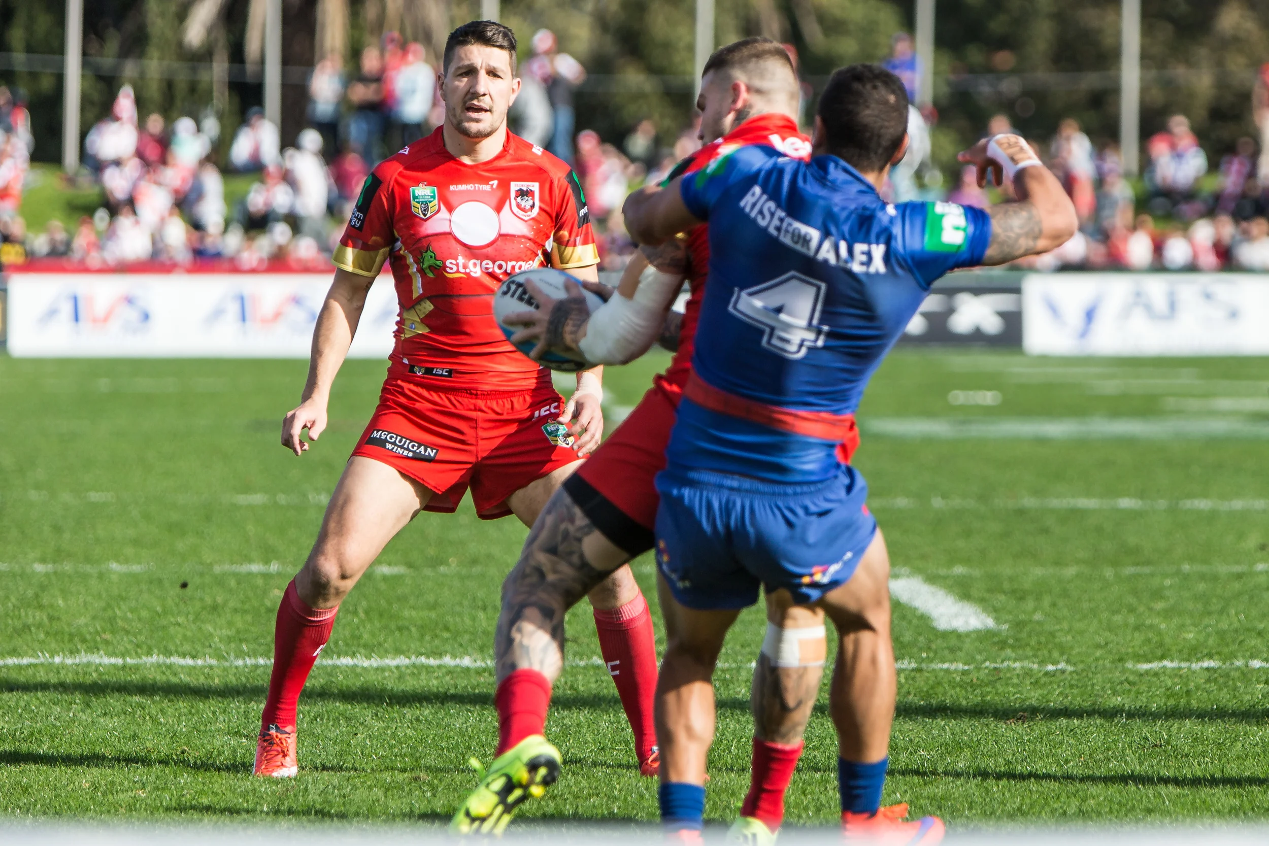 Gagai holds up Dugan whilst Widdop watches on
