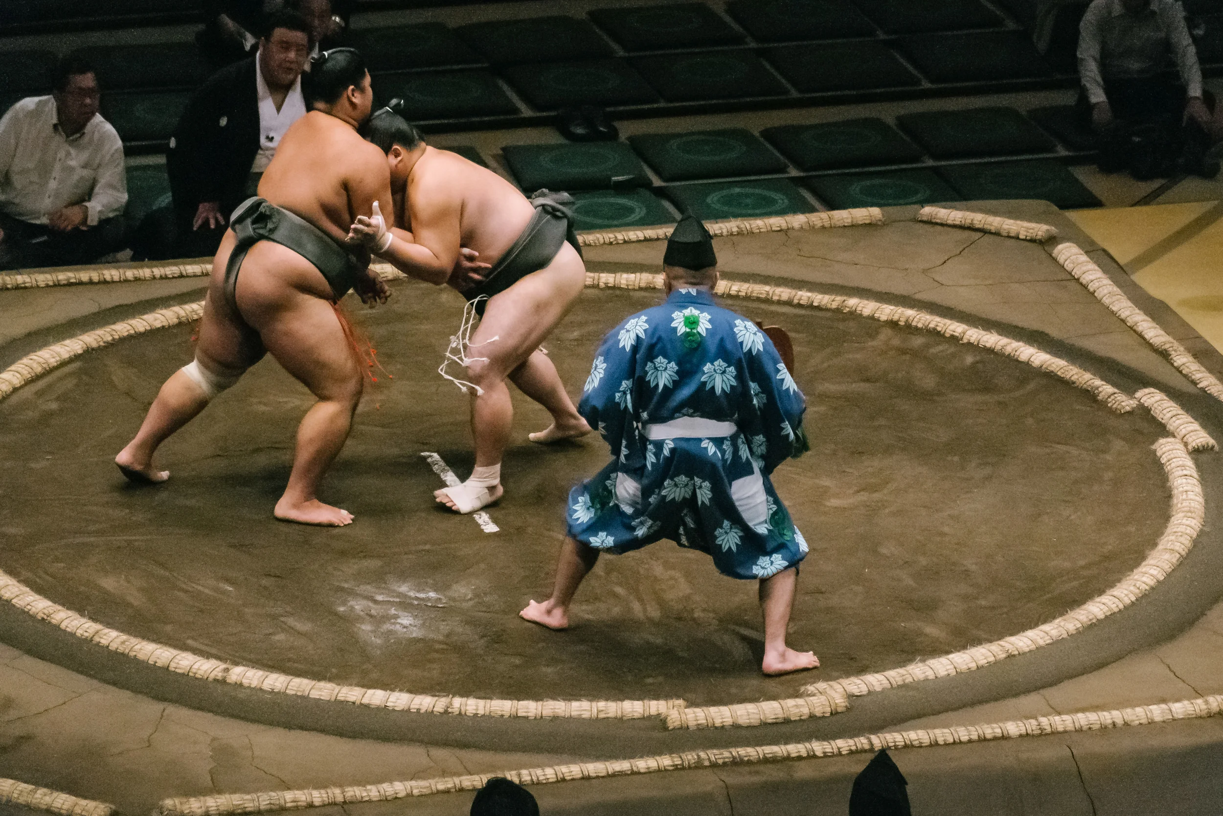Trying to get my bearings right. Actually oops I'm in the wrong seat watching this lower grade Sumo bout