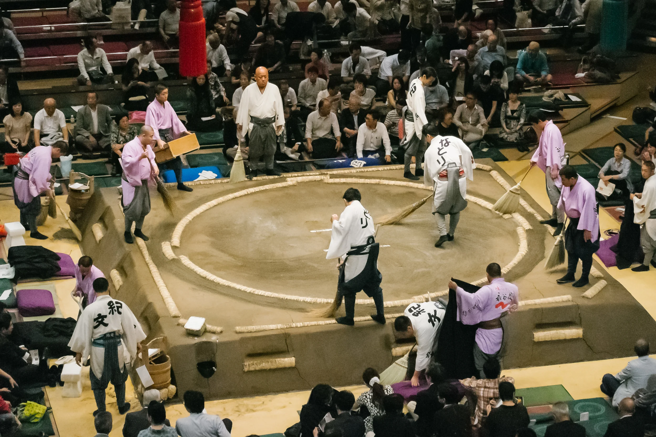 With so much rice being thrown in the ring gets a clean up during an interval between bouts