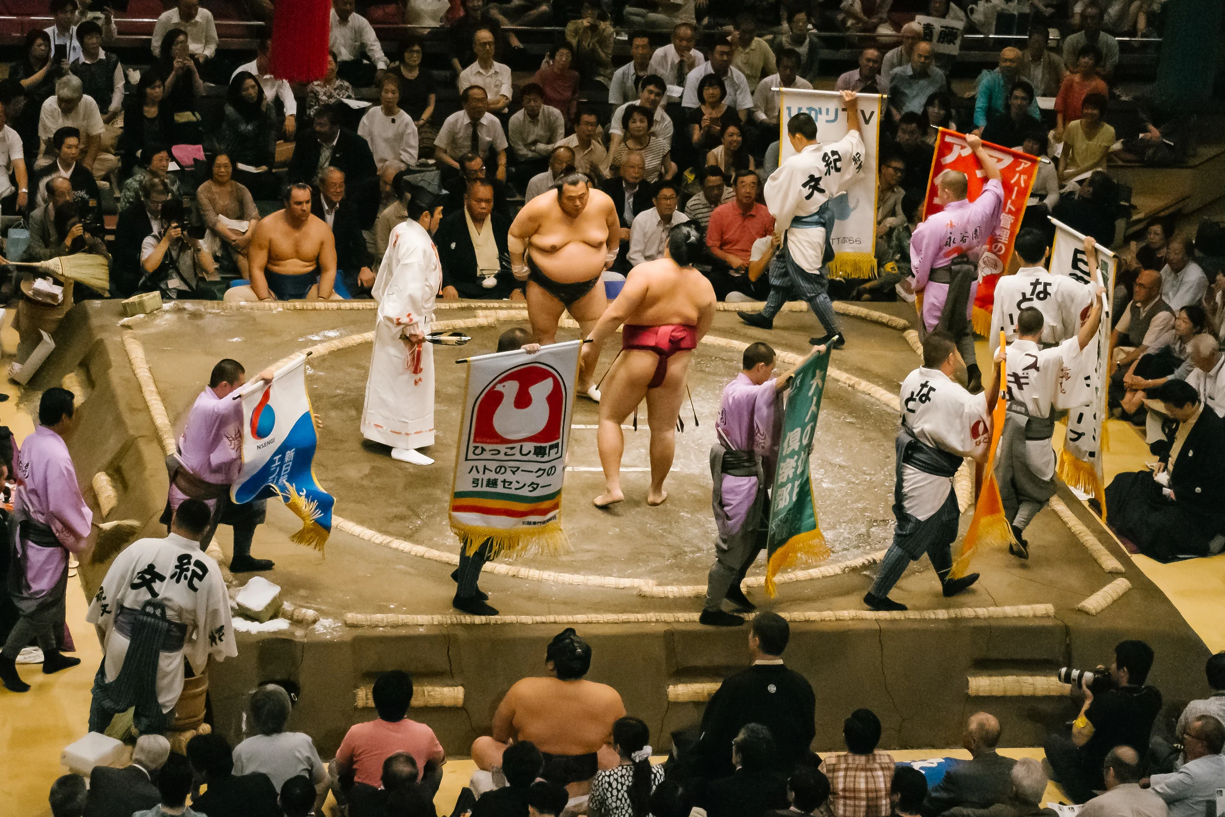 No ringside girls here, just men with advertisements