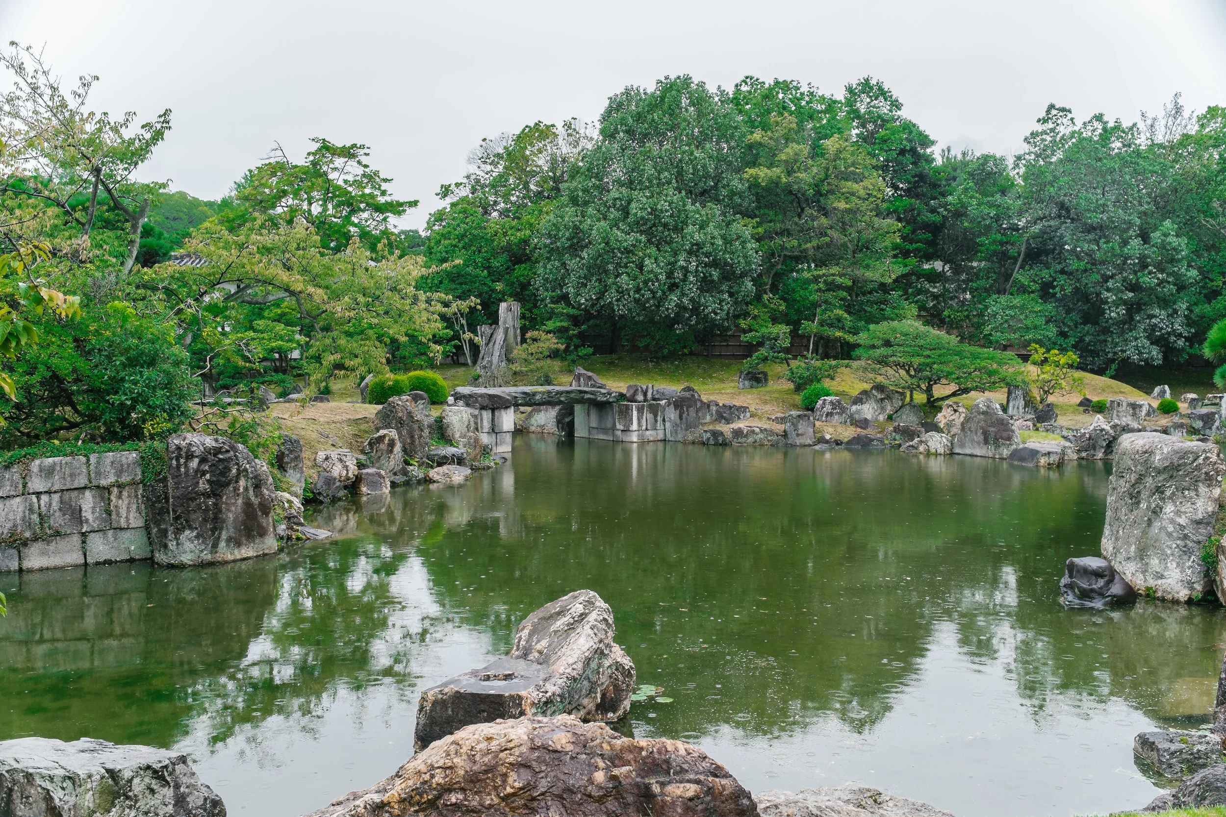 This pond is impressive with it's own waterfall and these massive huge rocks standout.