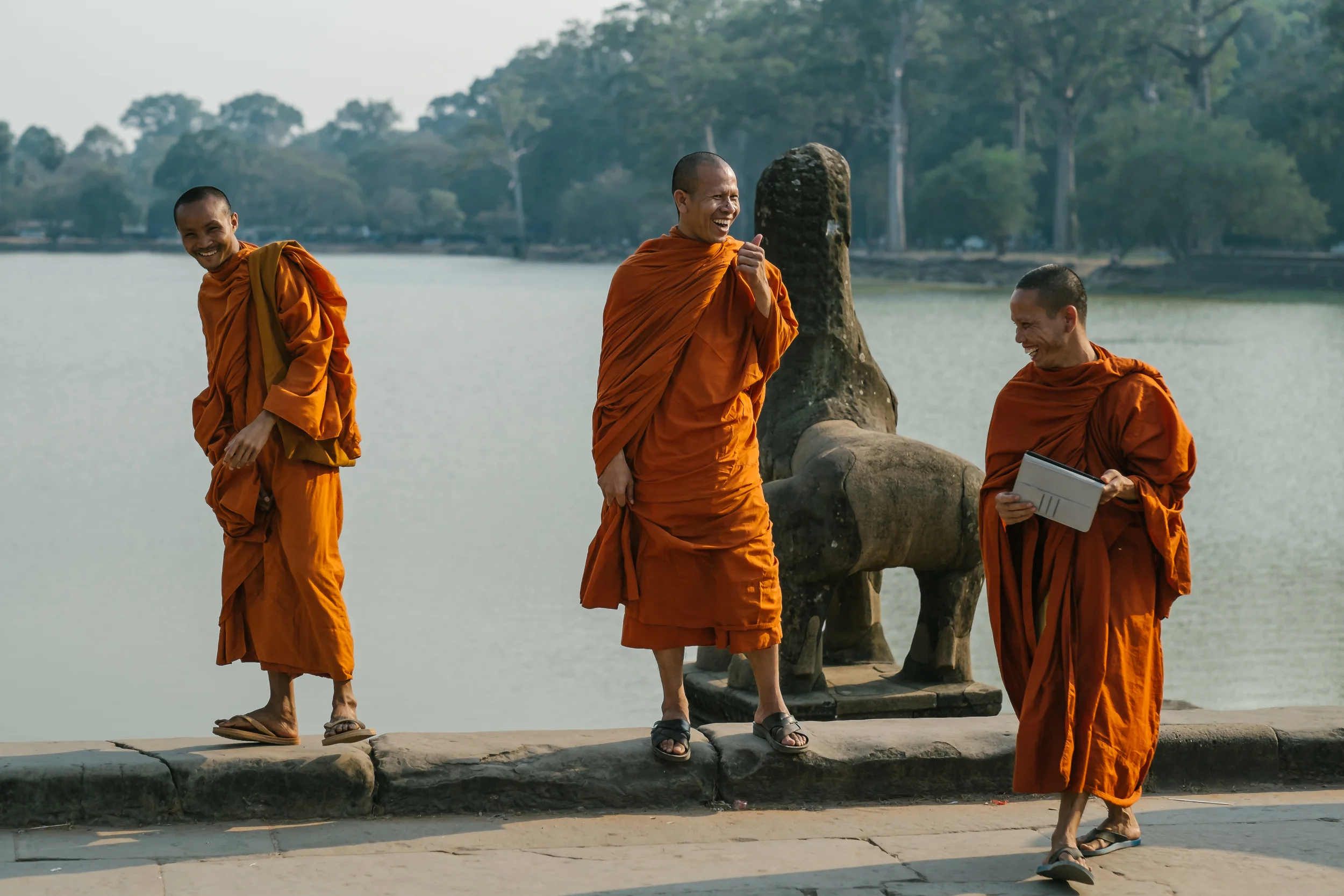 Many of the monks are asked to pose for photos but also enjoy their time. Fuji X-Pro 1, 56mm f/1.2 R