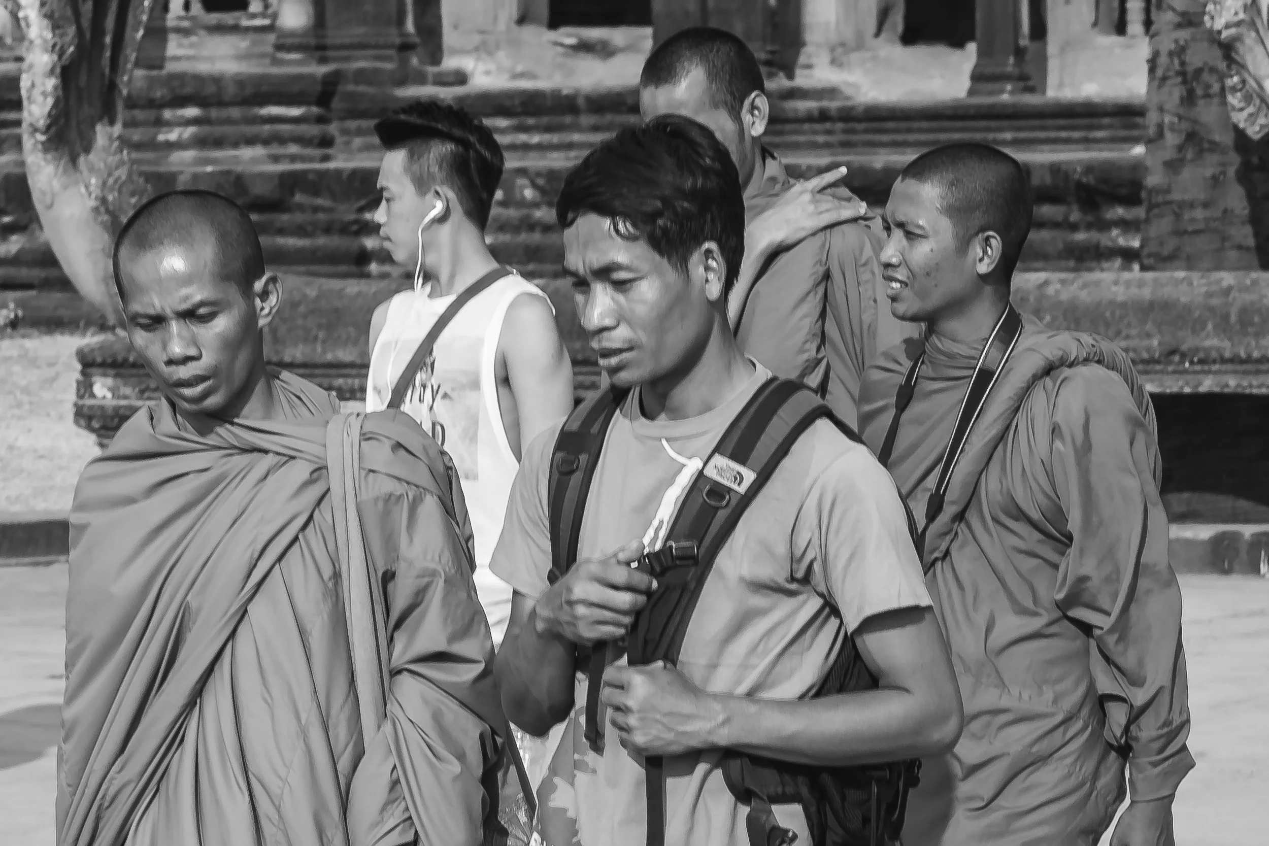 Many of the tourists are intrigued by the life styles the monks lead. Fuji X-Pro 1, 56mm f/1.2 R