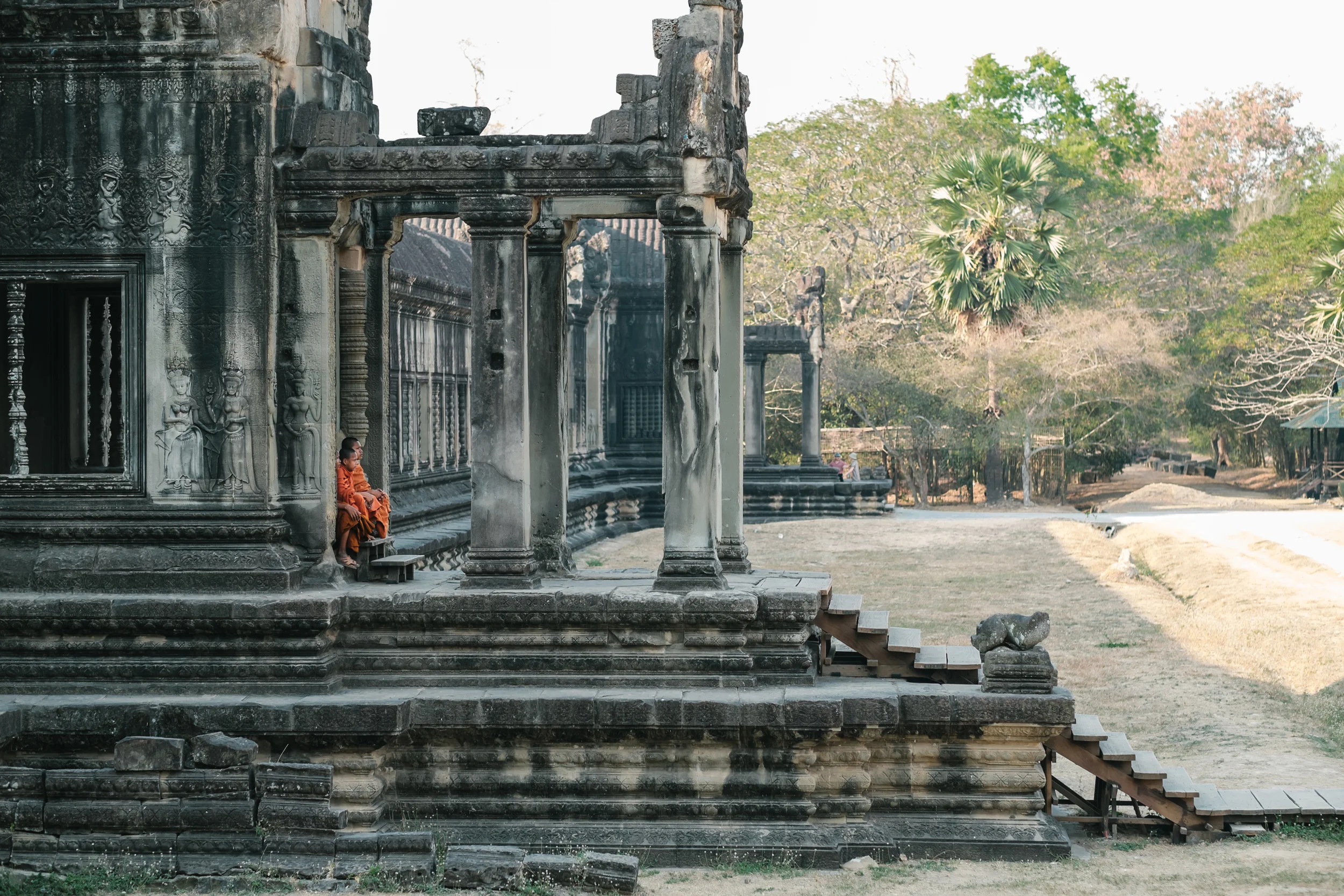 Pass through the gate entries and cannot believe the size of the temple. Buddhist reflecting on their days prayer. Fuji X-Pro 1, 56mm f/1.2 R