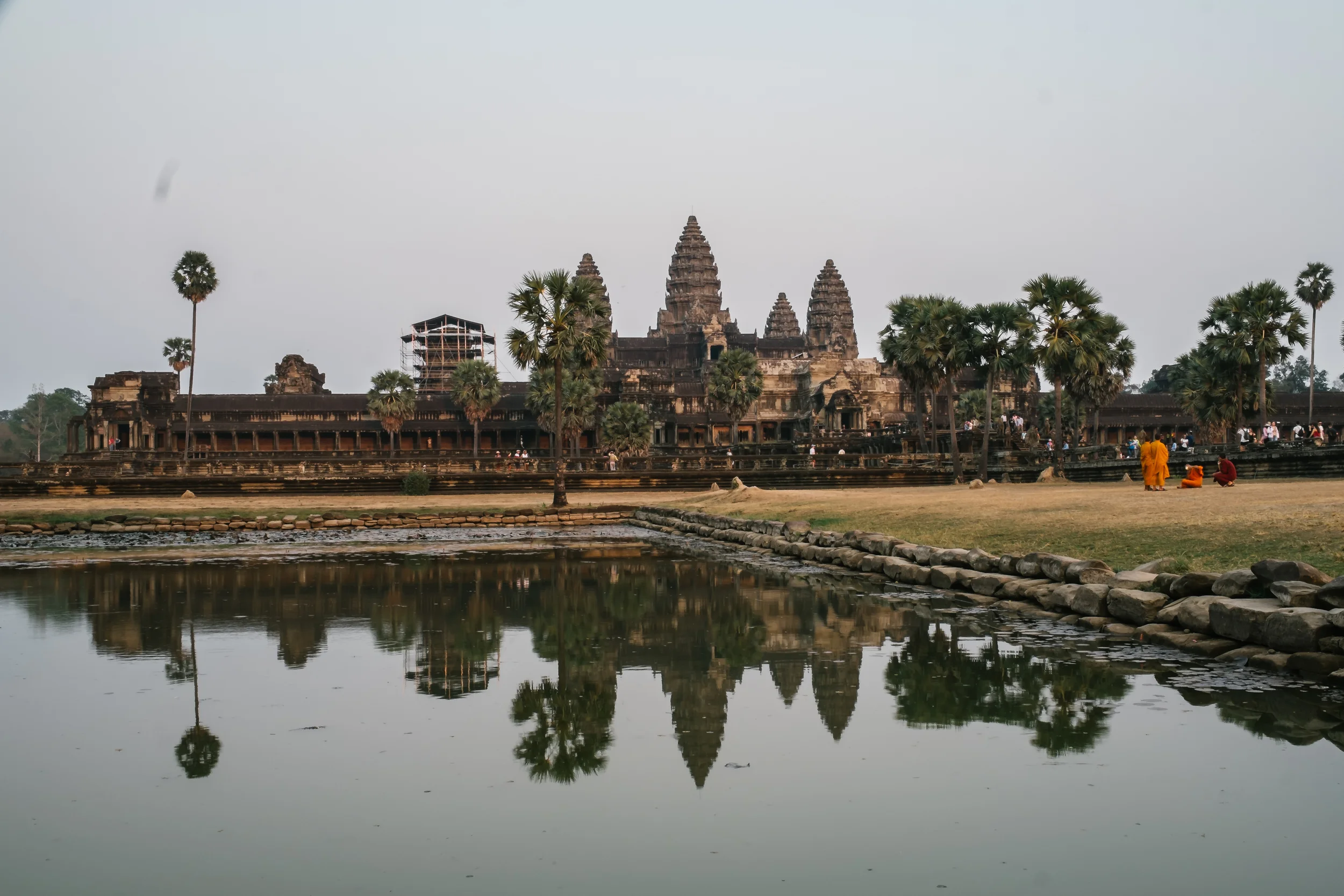 Me patiently waiting for sunset. I've decided to take this view, it is not perfect as a tourist had told me as I was supposed to see the 5 towers in the reflection, I only see 4.&nbsp; None the less it will make do. Fuji X-Pro 1, 23mm f/1.4