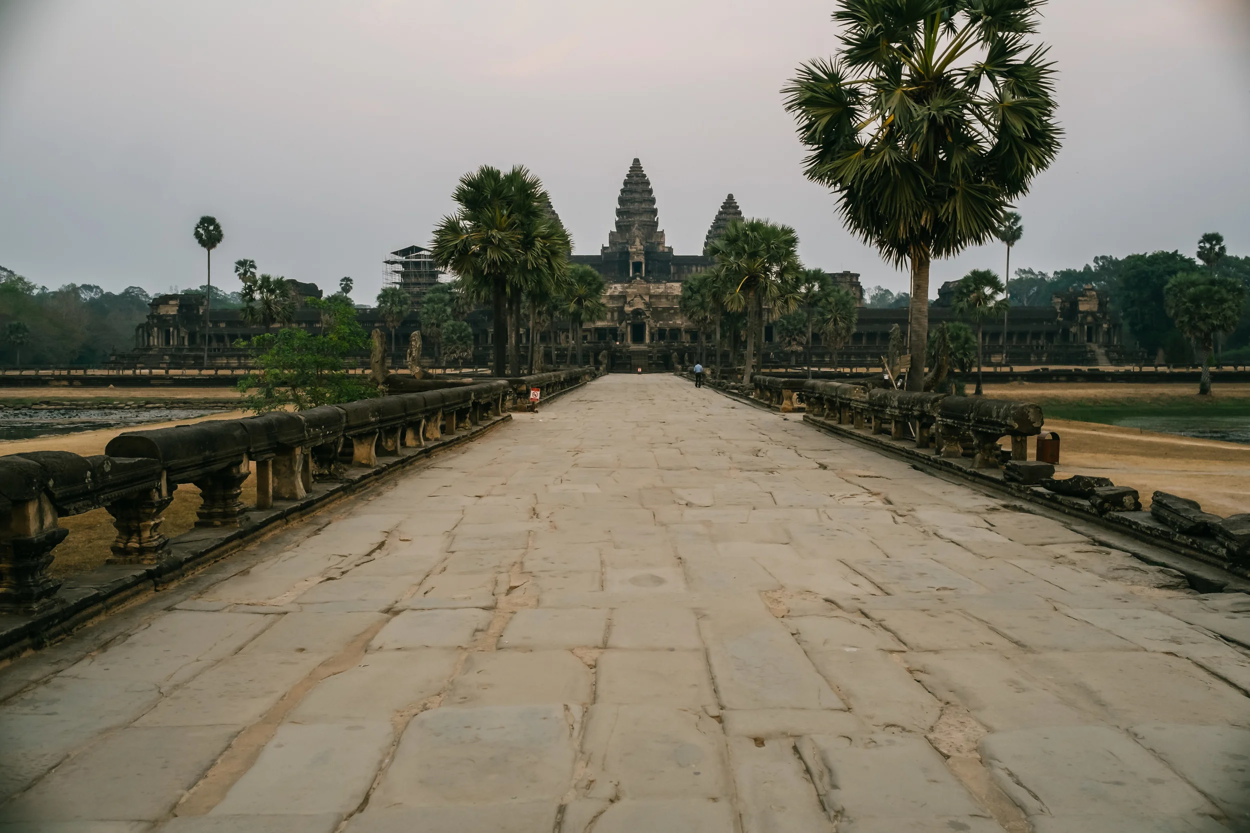 I got kicked out around 6:15pm and am not pleased as the sunset was just coming out with some purple and blue hues which I was hoping would wrap around the back of Angkore Wat. Fuji X-Pro 1, 23mm f/1.4