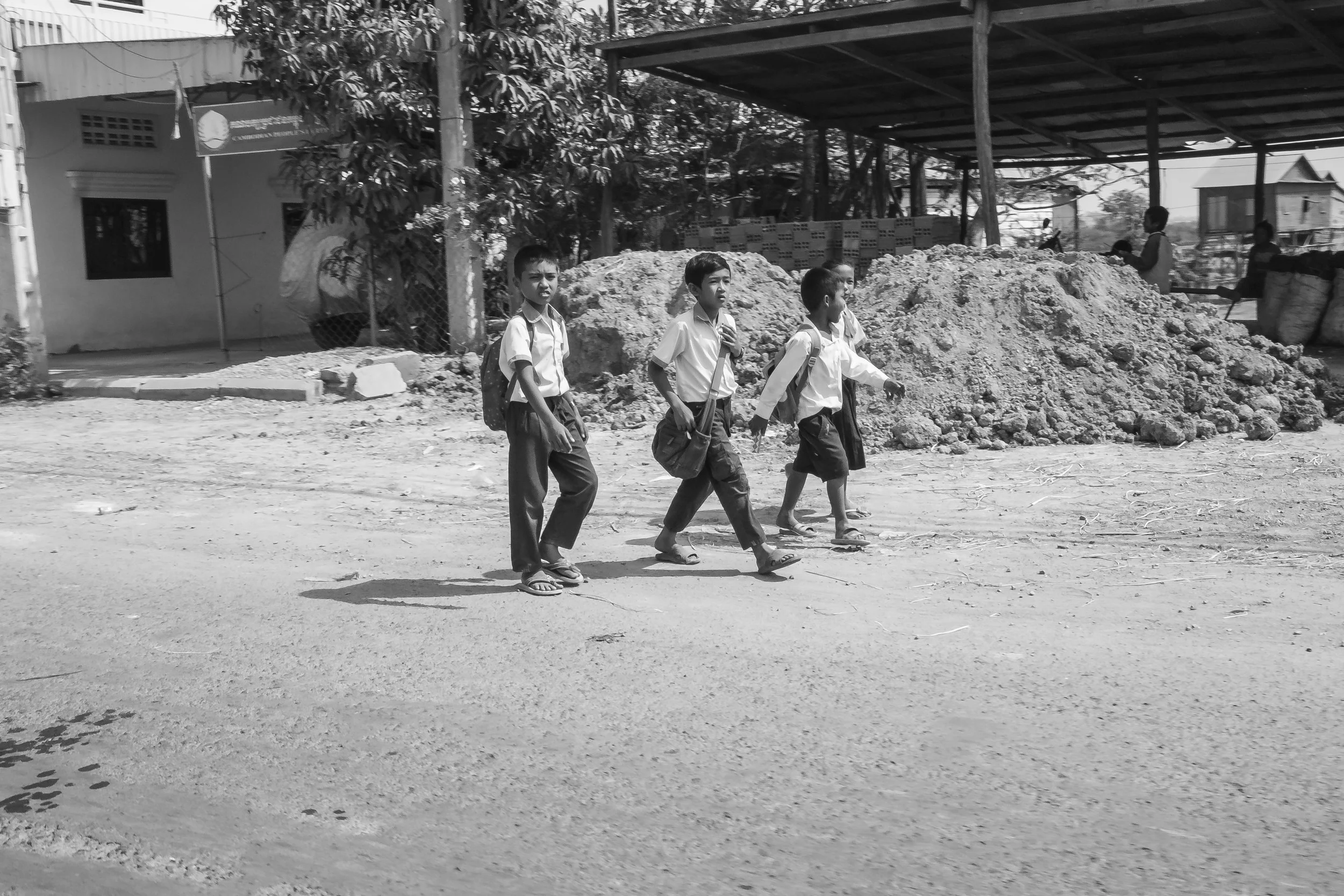 Happy kids walking to school. Fuji X-Pro 1, 23mm f/1.4