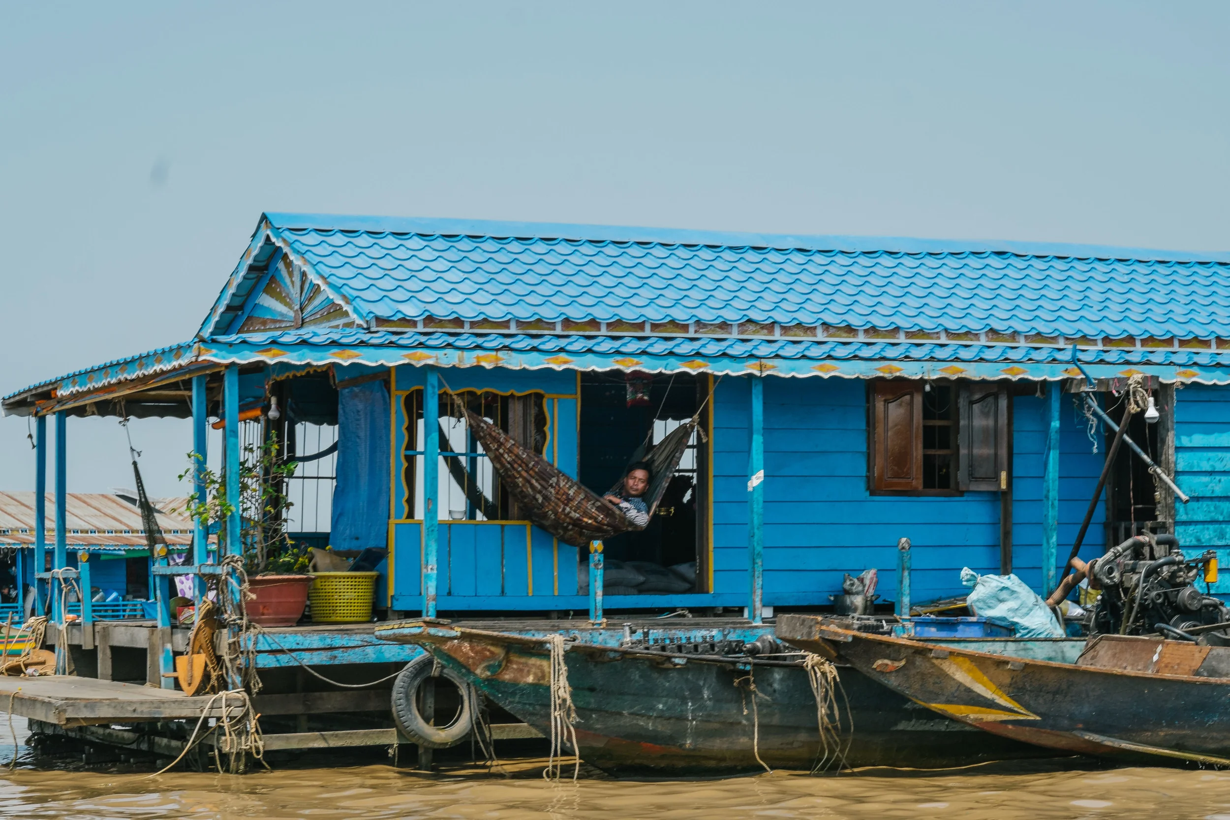 The life of a fisherman on his long break, resting up in a hammock. Fuji X-Pro 1, 85mm f/1.2 R