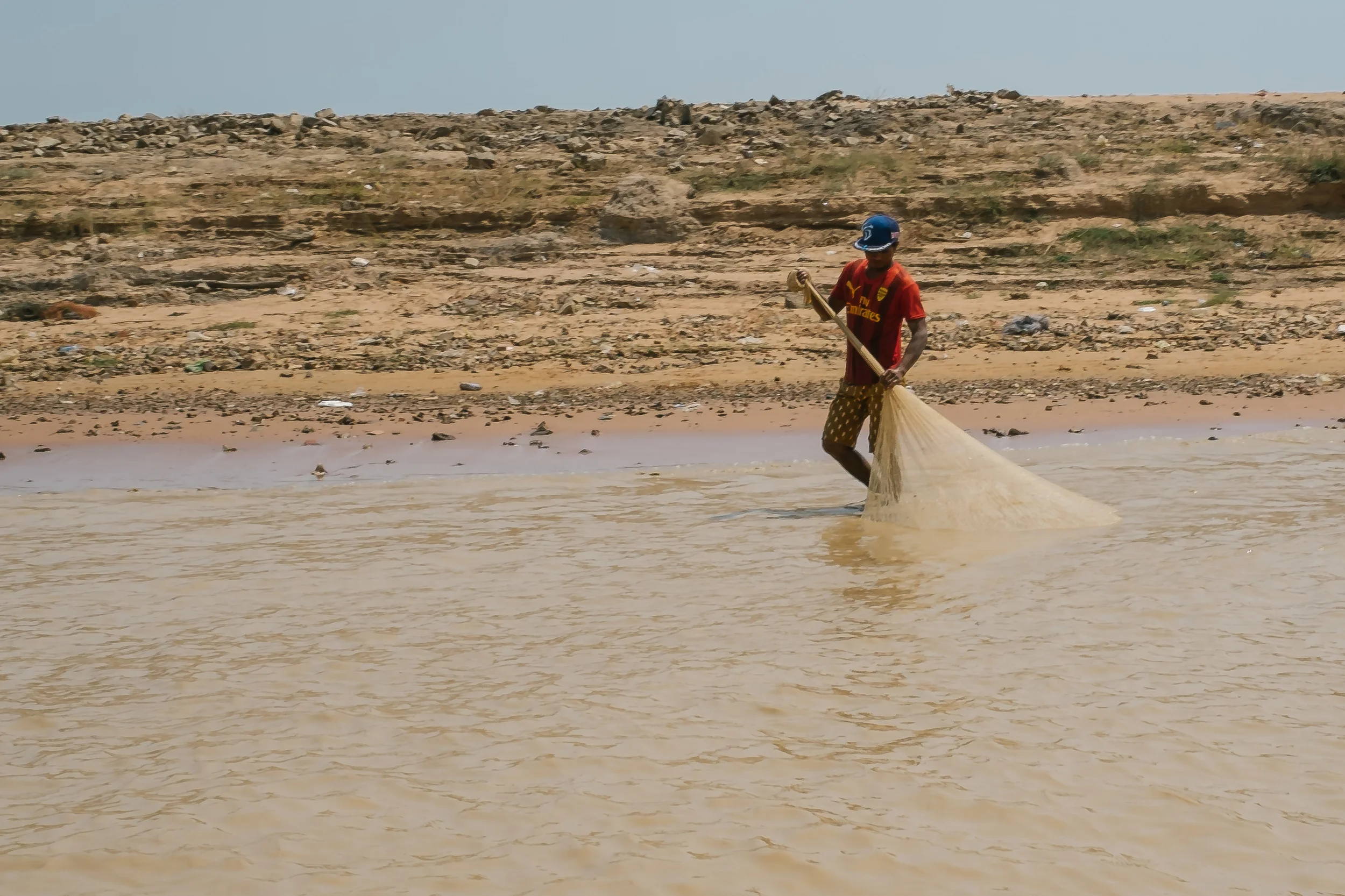 The guide said that this guy was allowed to fish in this shallow part of the lake. Fuji X-Pro 1, 23mm f/1.4