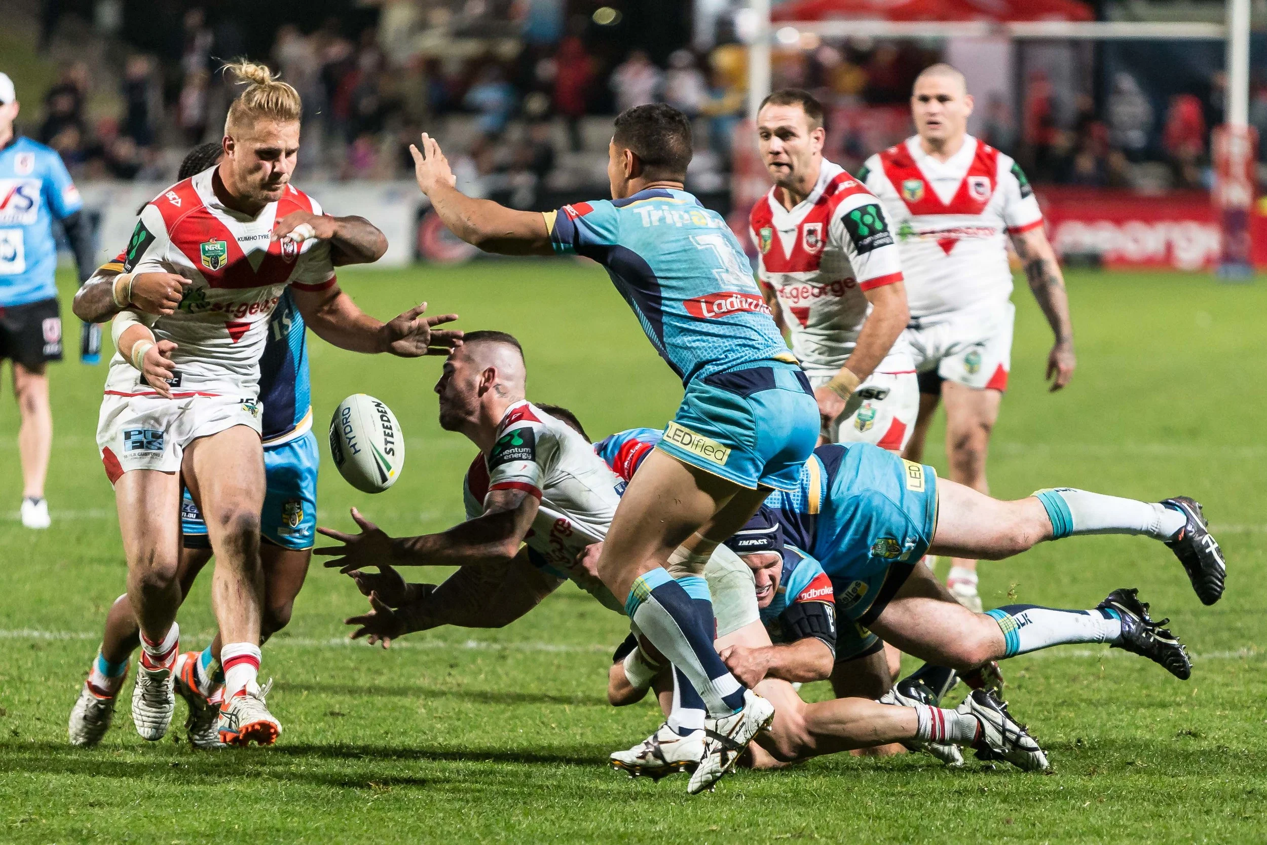 de Belin taken with out the ball? Penalty me thinks? but it was no play on