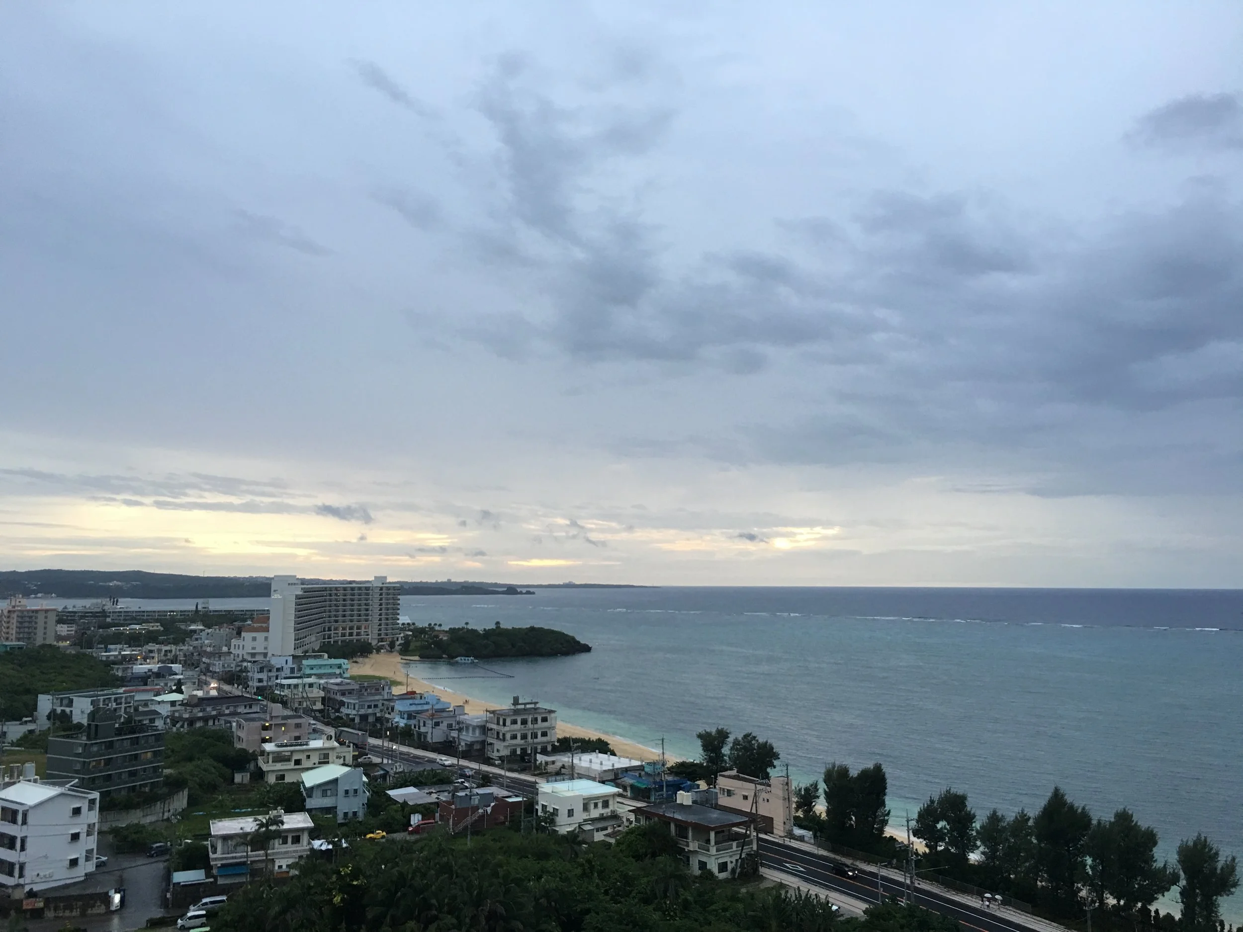 Checking in to Kafuu Resort Fuchaku, the condo is large with a nice view, hopefully the beautiful sunset is a sign of better things to come in regards to the weather. The beach is just across the road.