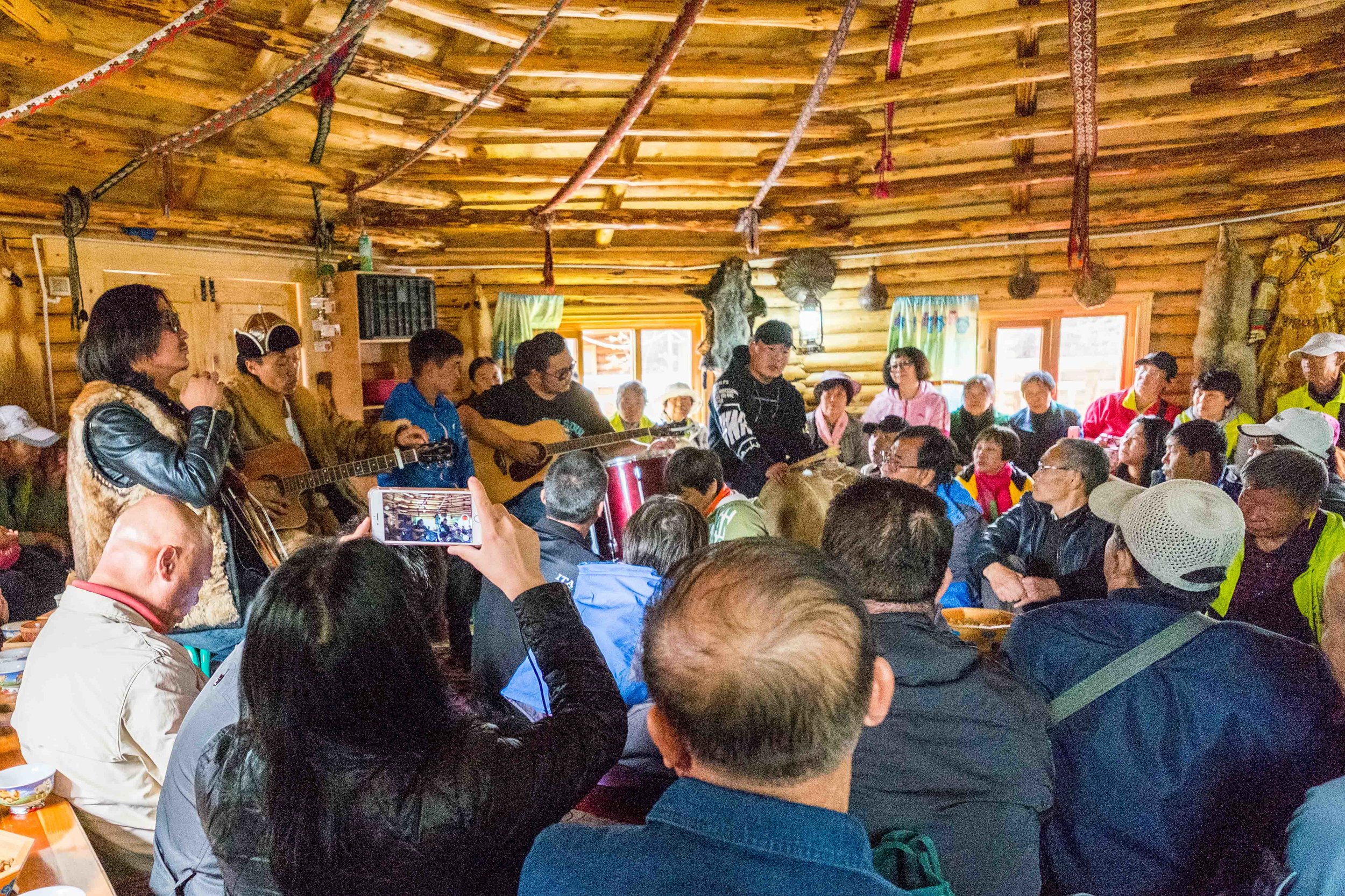 Lambs milk on offer but the band were going hard singing folk songs at Xinjian Kanas National Geopark