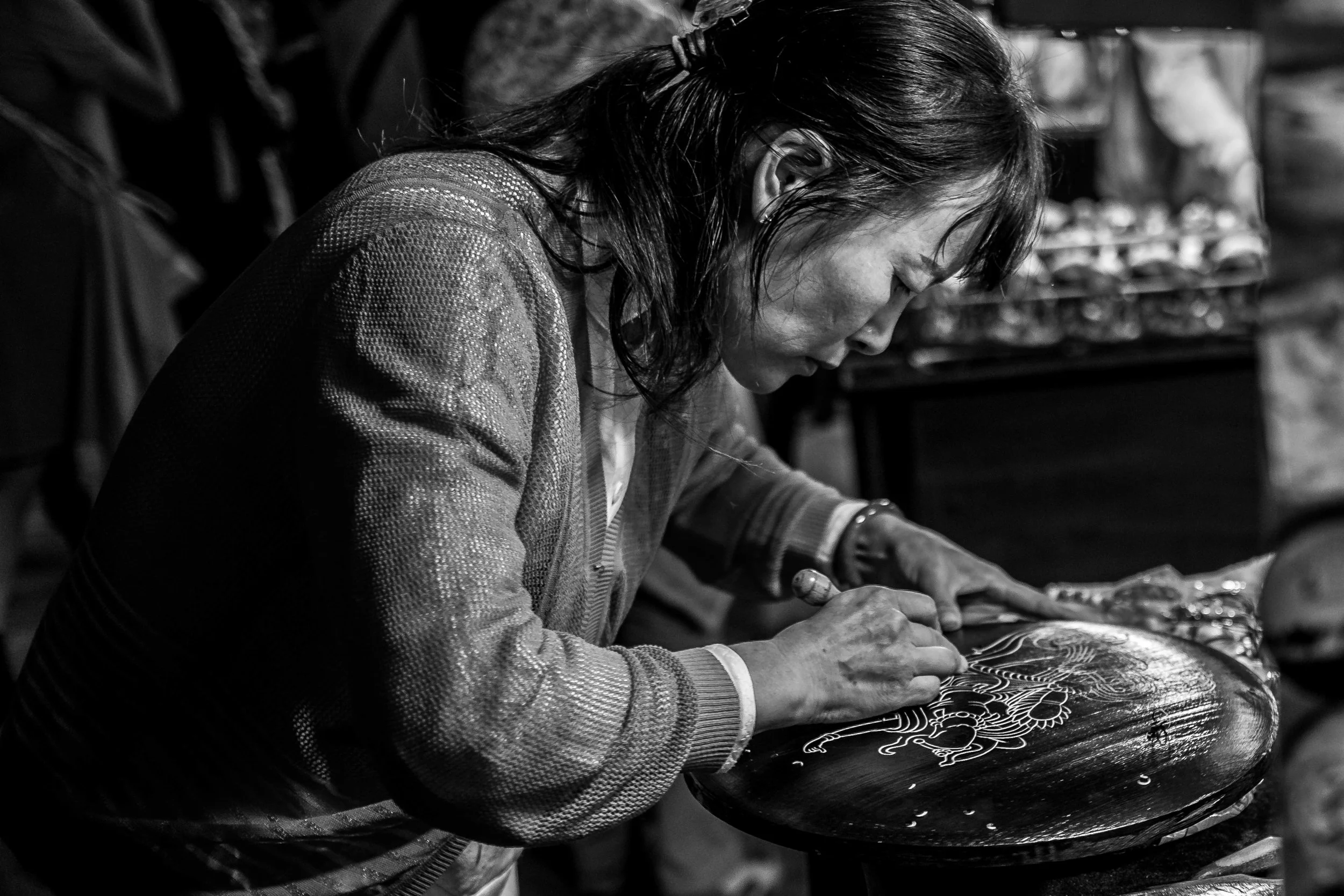 Wood carvings done on the spot at the night markets. Dunhuang