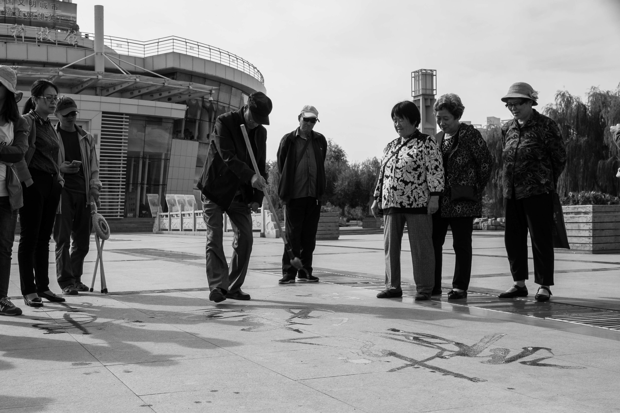 Practicing Calligraphy. Jiayuguan city garden