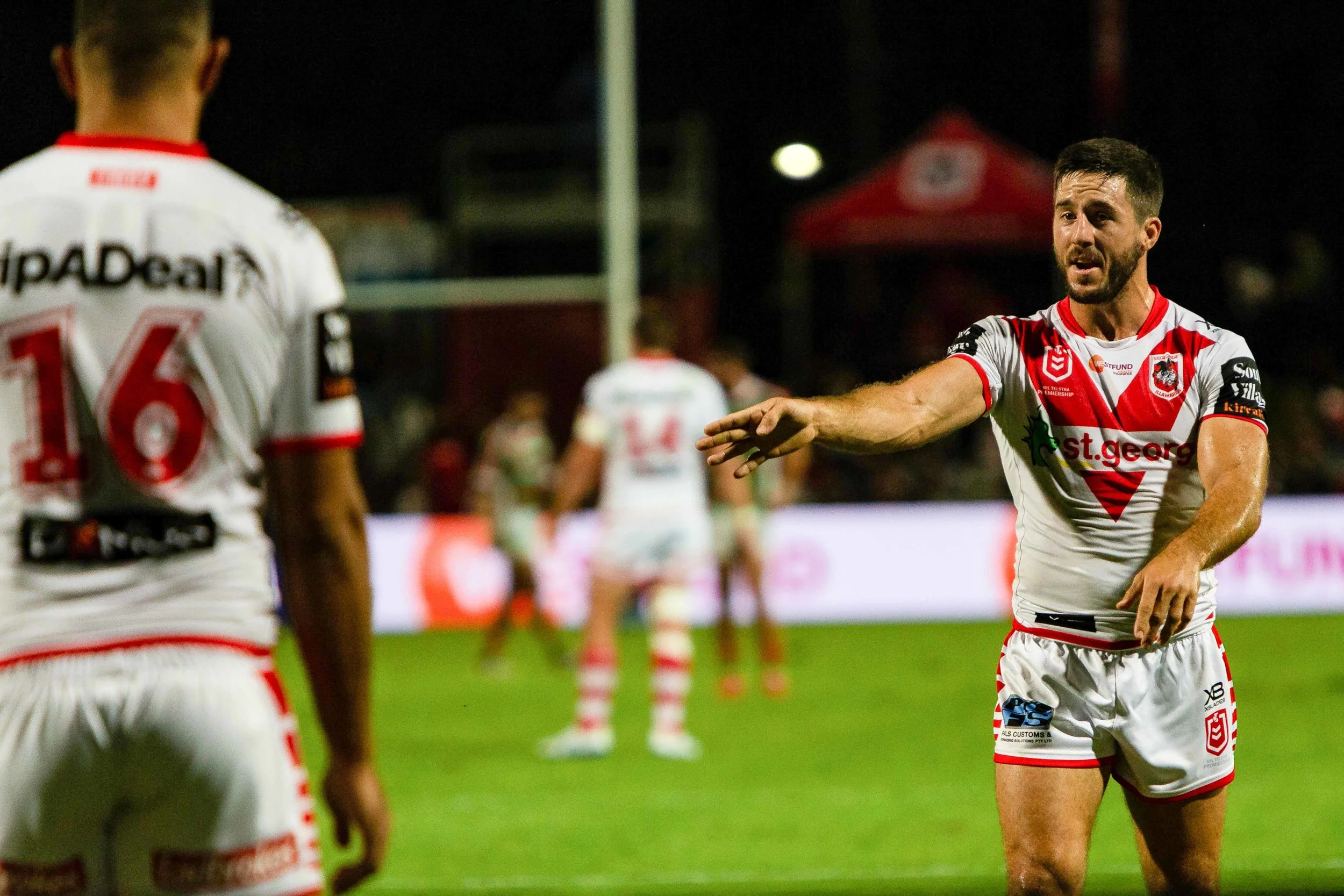 Hunt motioning to the rookie where he wants him