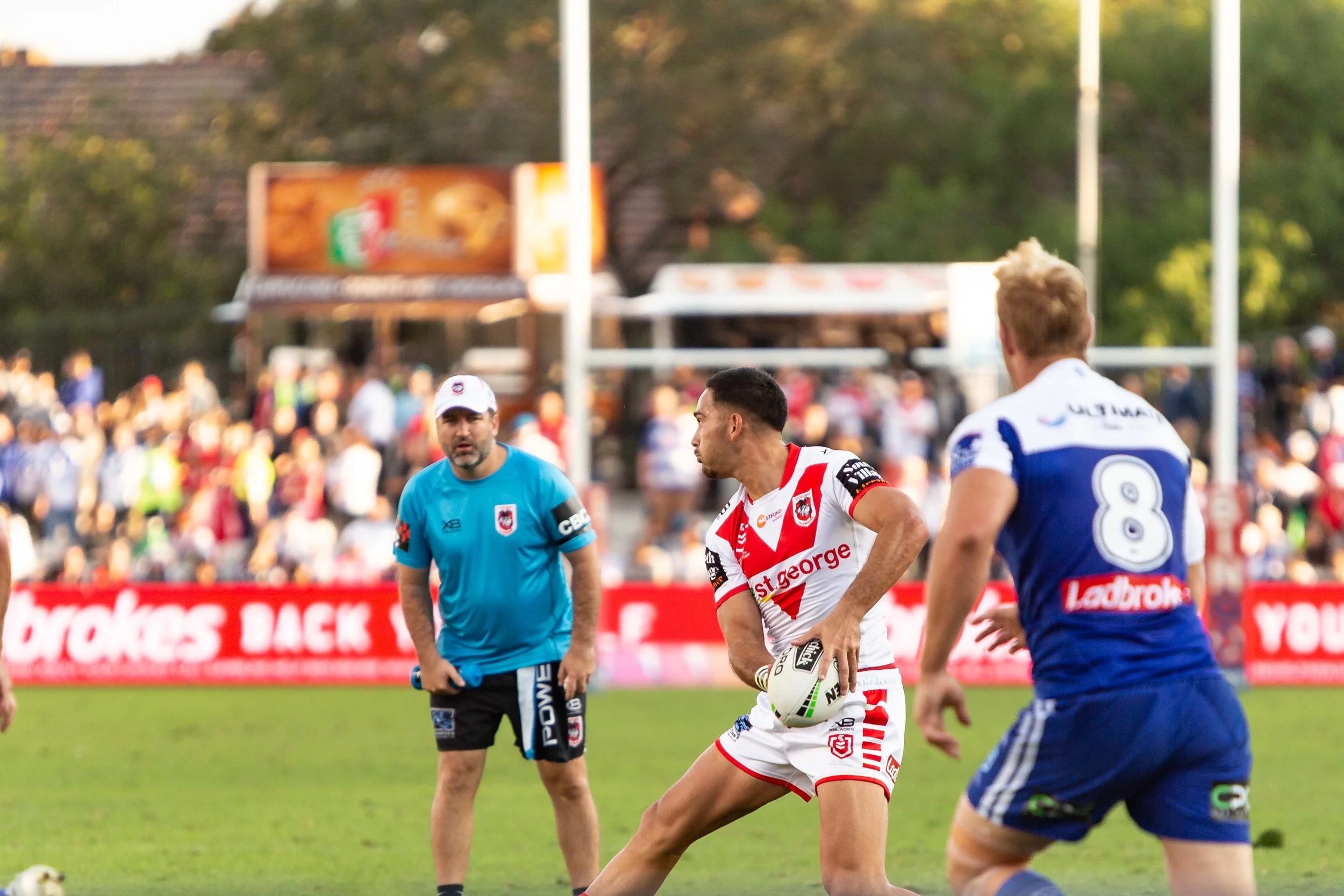 Normy to Head.. is the blue shirt allowed to coach on ground?