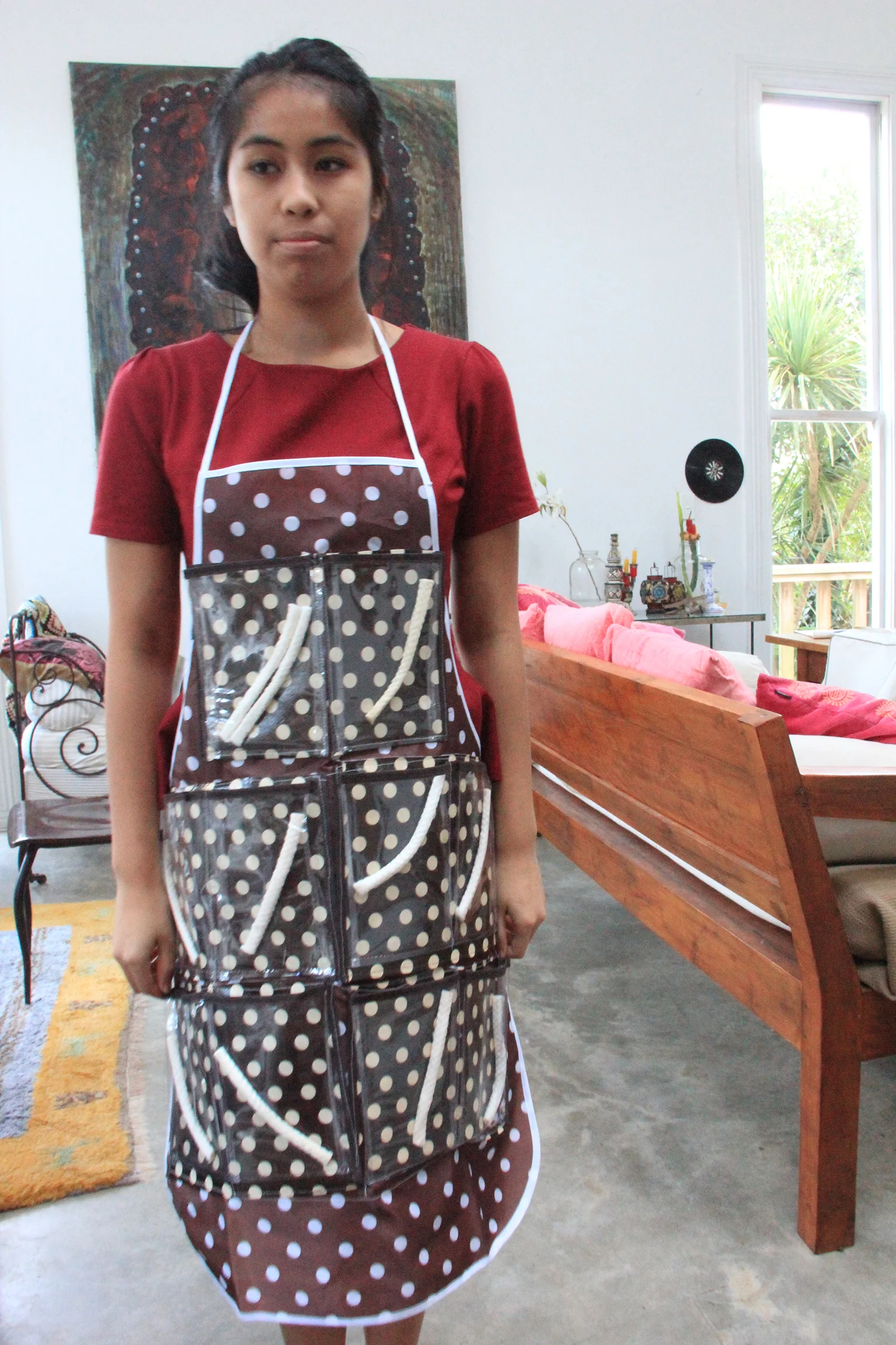 Jane Nimsoongnem models the perfume stick apron