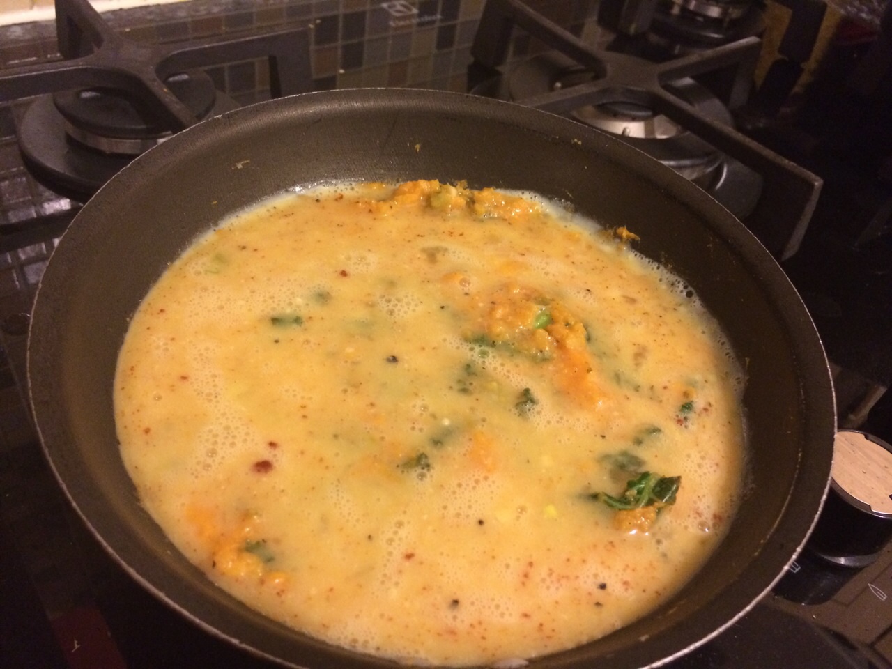 Flatten into pan and pour over beaten egg