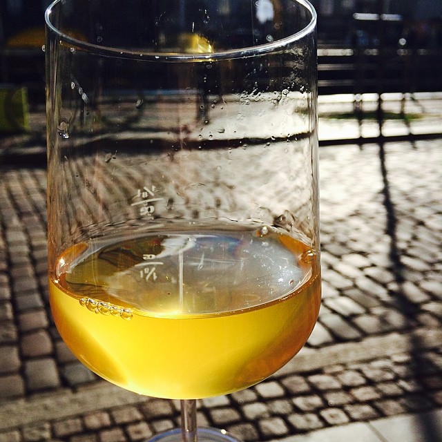 Glass of the very #natural unfiltered #buteo #wine - rather delicious in the evening #sun despite it being a #cold day in #copenhagen