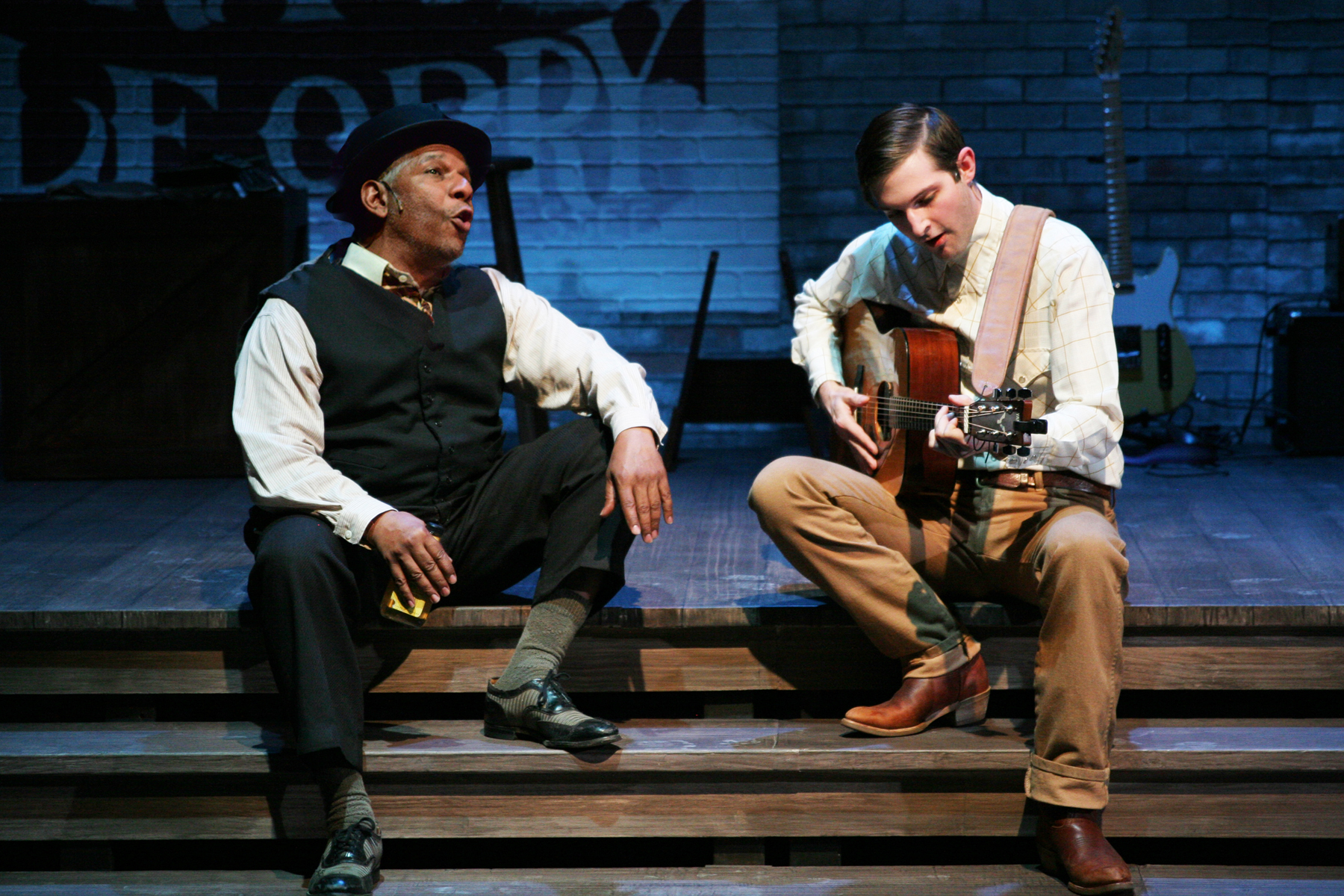 Dwight Mahabir, Kevin Singer. Scenic Design by Liliana Duque Pineiro, Costume Design by Valera Coble, Lighting Design by Allen Willner, Sound Design by Lawton Lovely. Photo by Terry Sullivan.